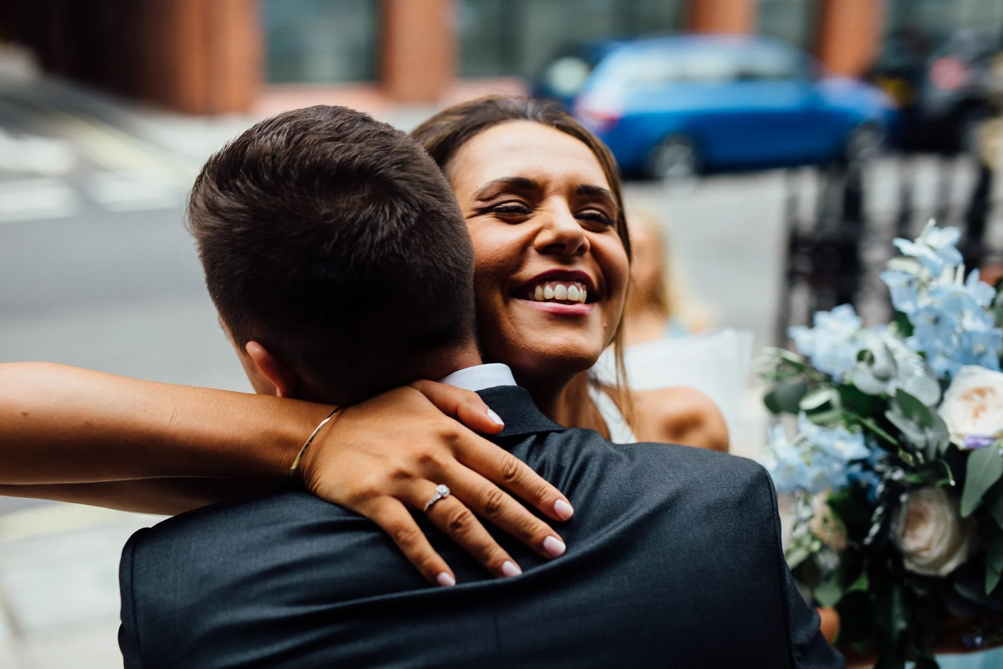  Bride hugging a guest 