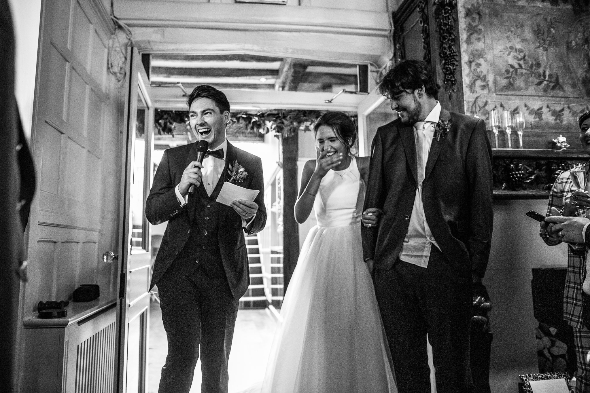  Groom laughing during his speech at Laura Ashley The Manor Elstree 