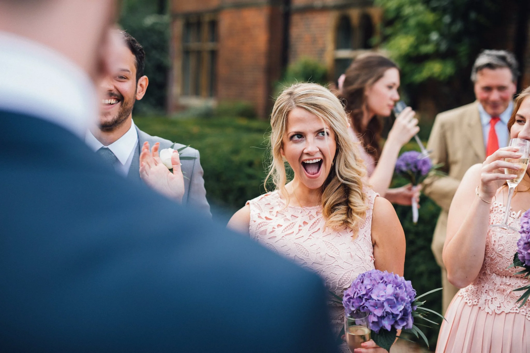  Wedding guest laughing and smiling 