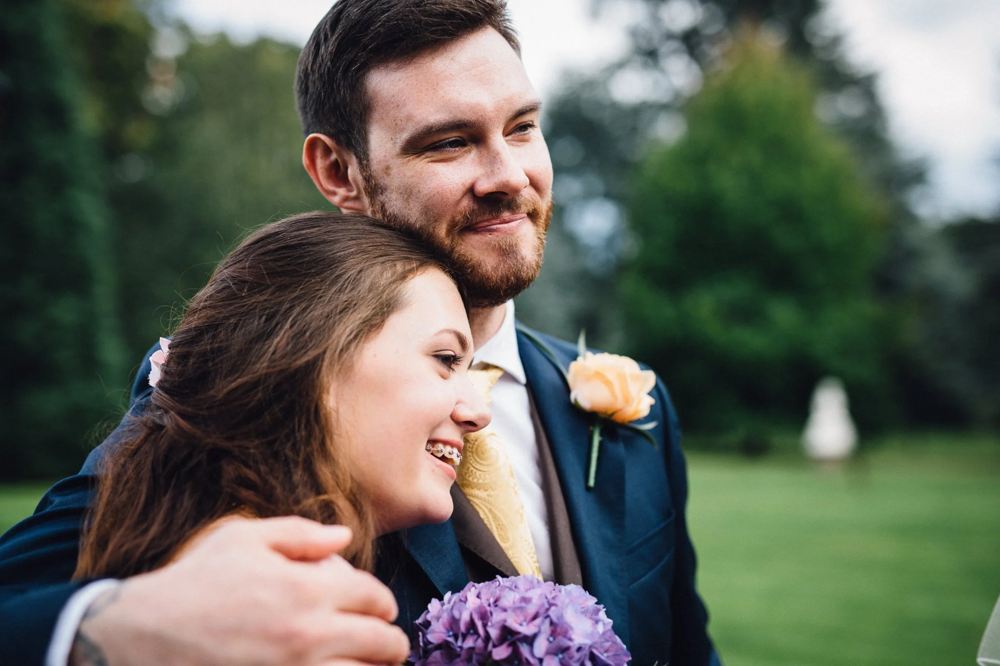  Groom hugs his sister 