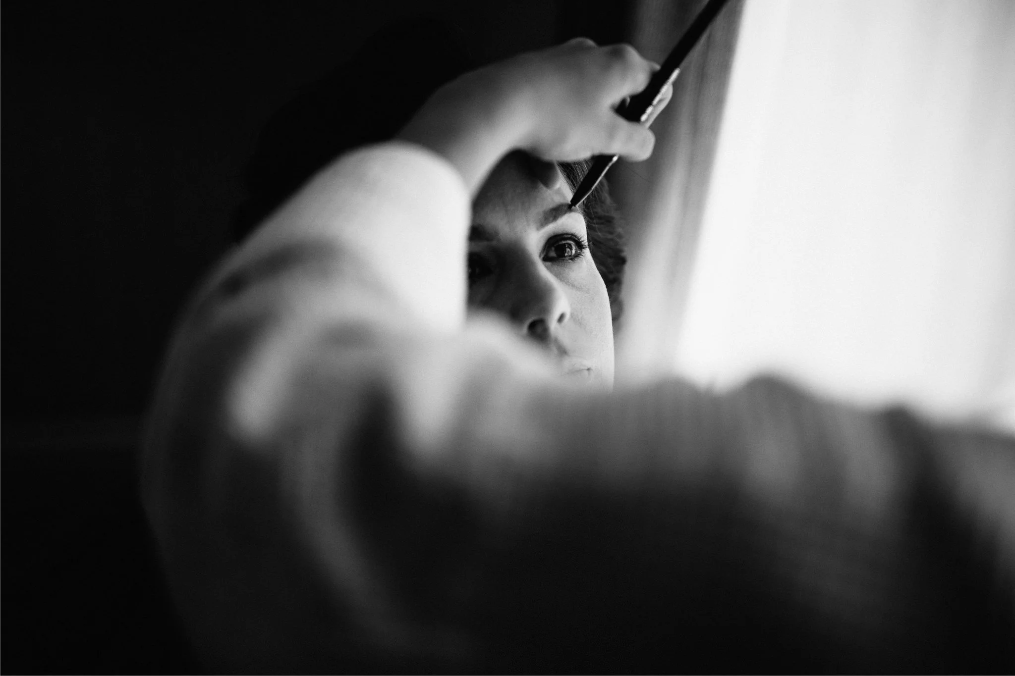  Bride has makeup applied to her eyebrows at The Landmark London hotel 