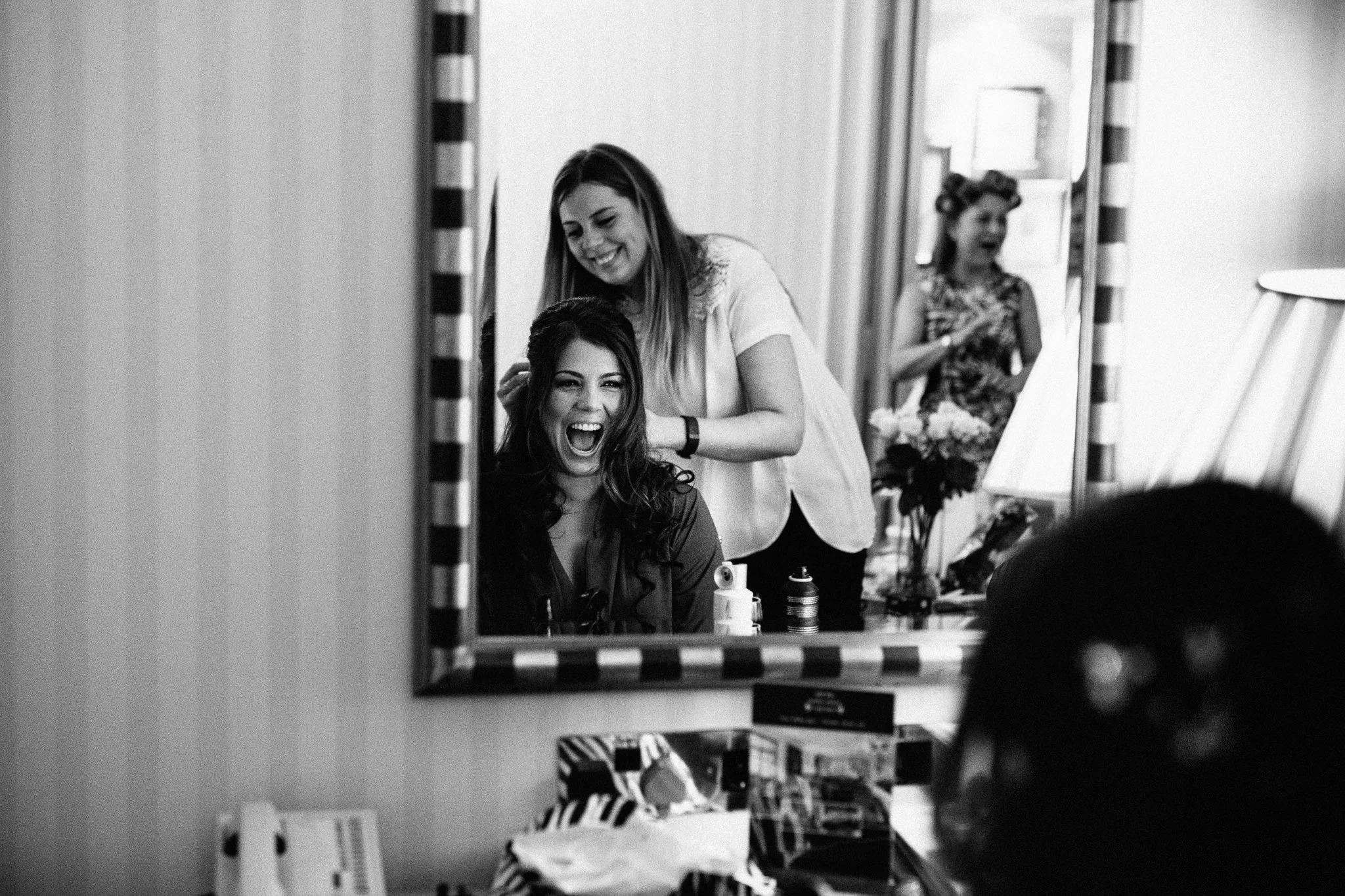  Bride with big smile on her face before her wedding at The Landmark London hotel 