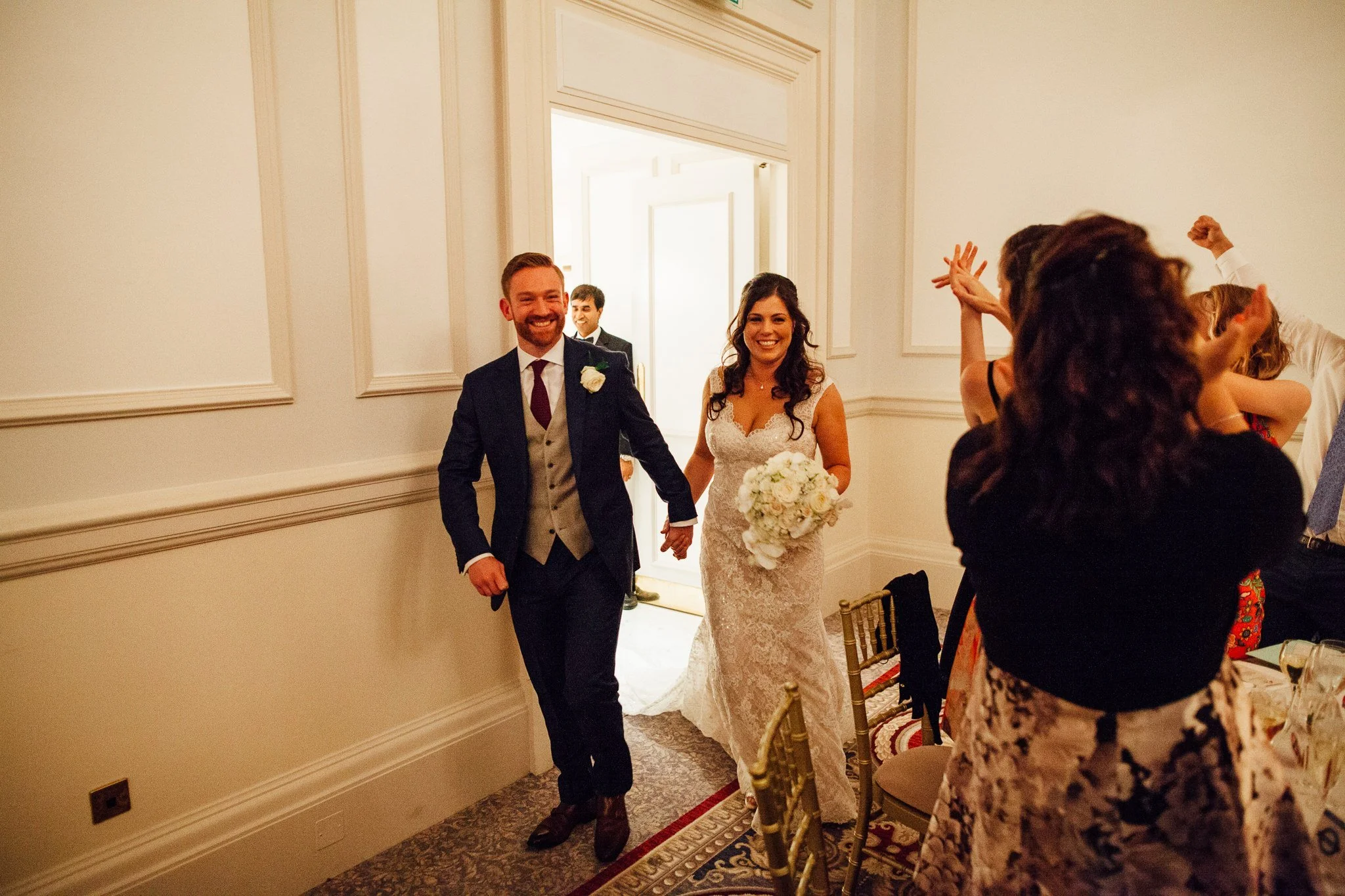 Bride and Groom our announced in to the wedding breakfast at The Landmark London hotel 