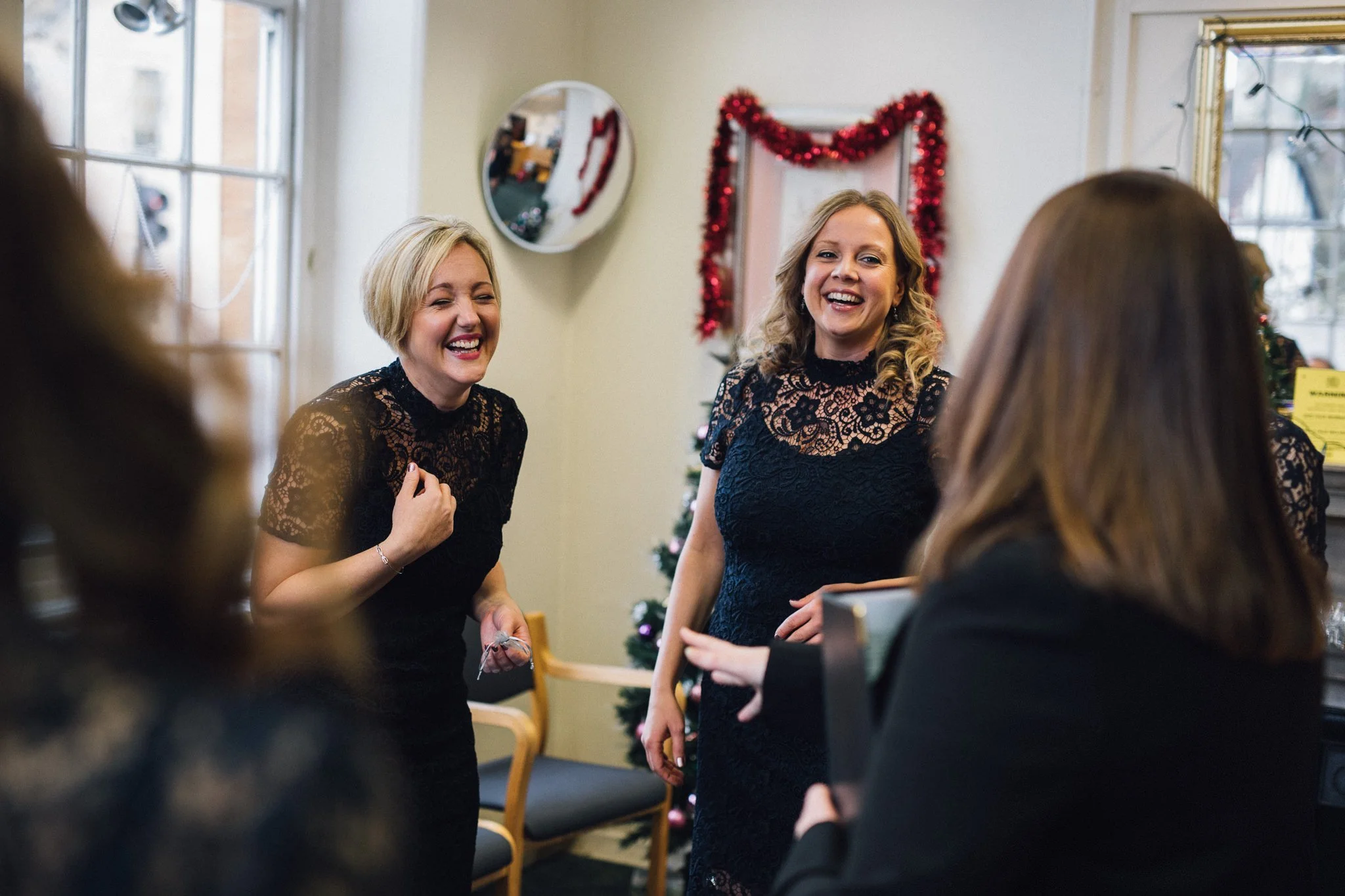 Bridemaids laughing at Oxford Register Office 