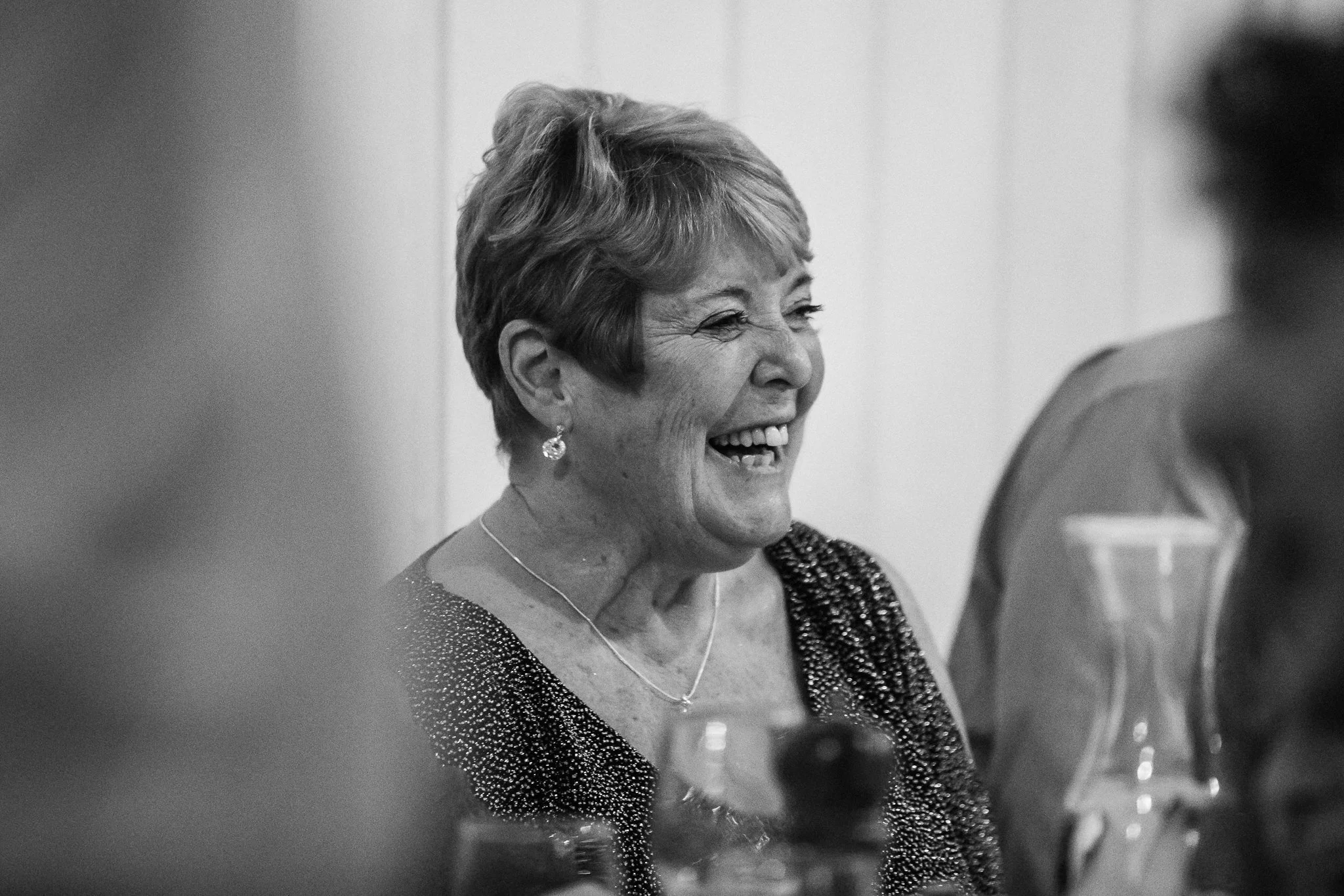  Guest smiling during the speeches at Jam Factory Oxford 