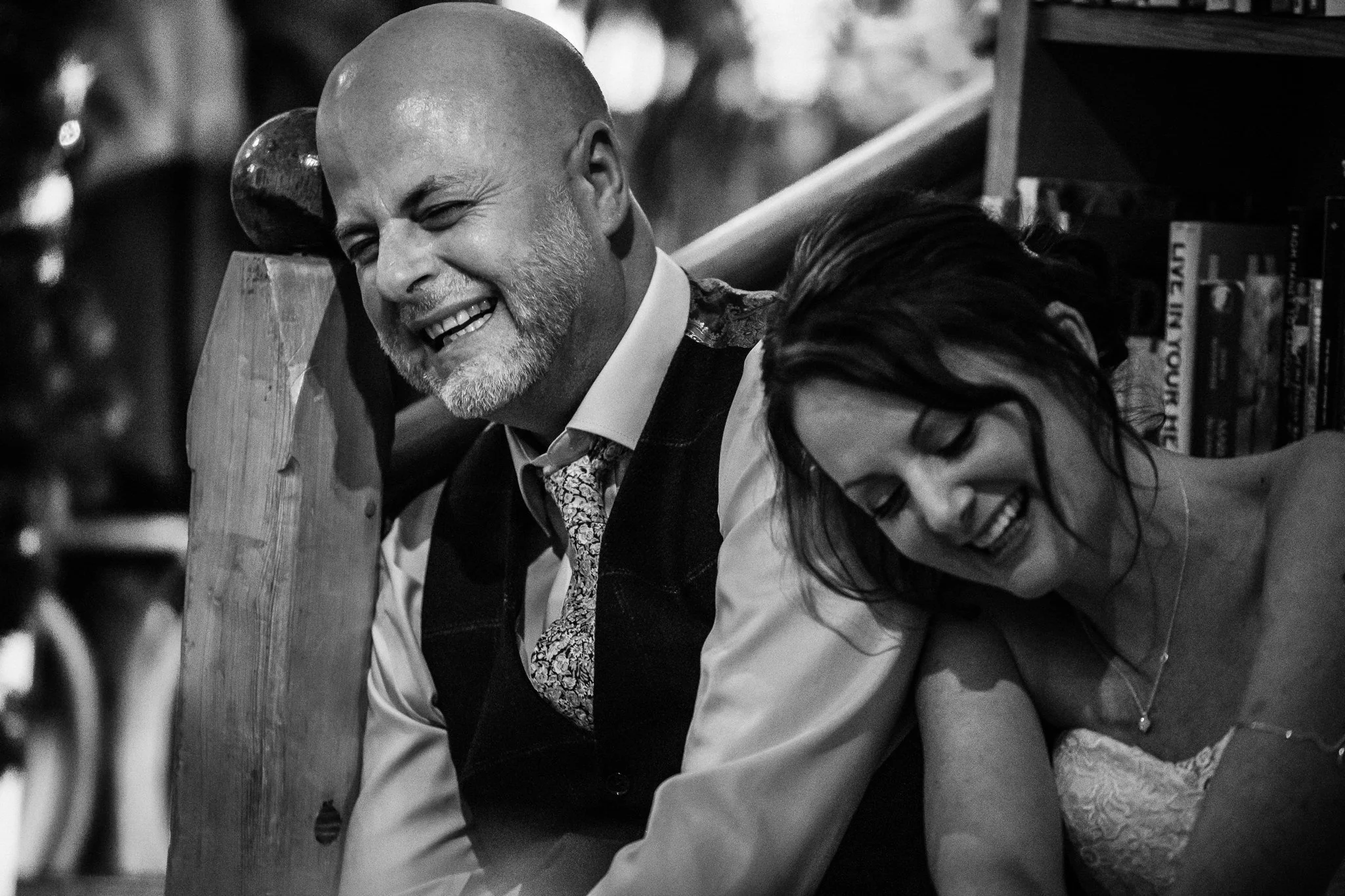  Bride and Groom laughing during speeches 