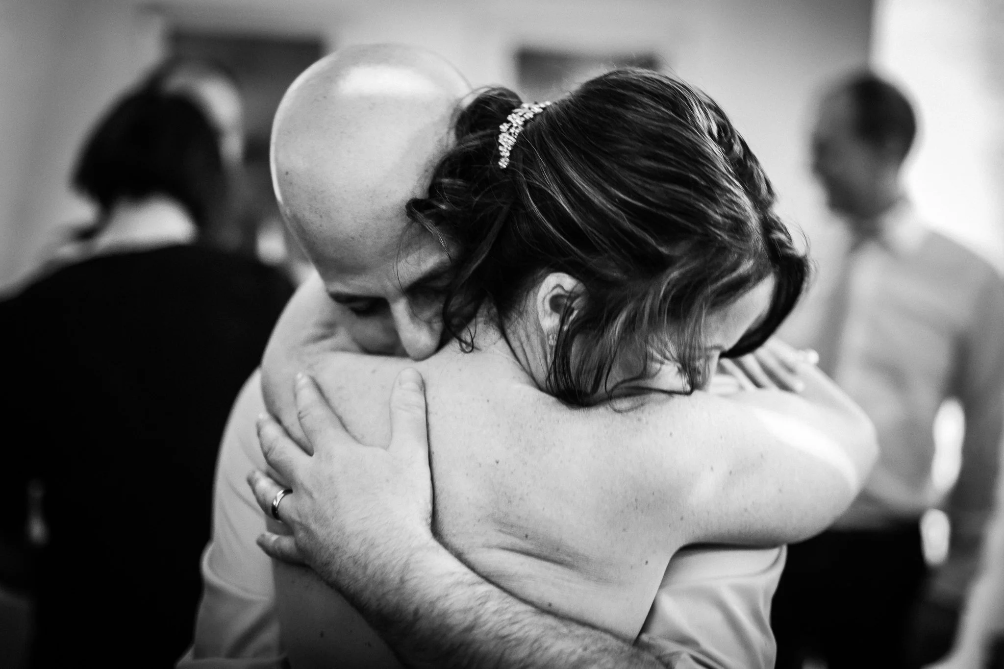  Bride and Groom hugging during the first dance 