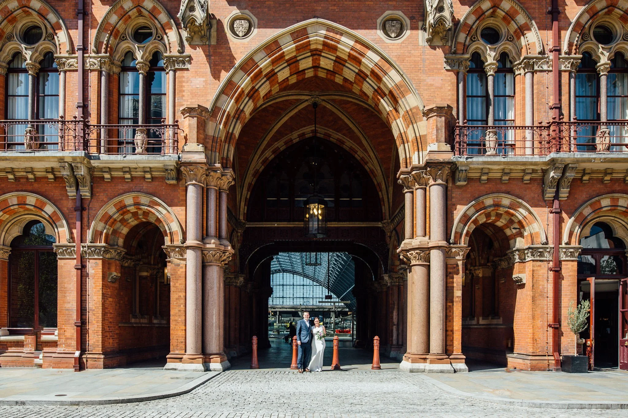  Bride and Groom in front of St Pancras station 