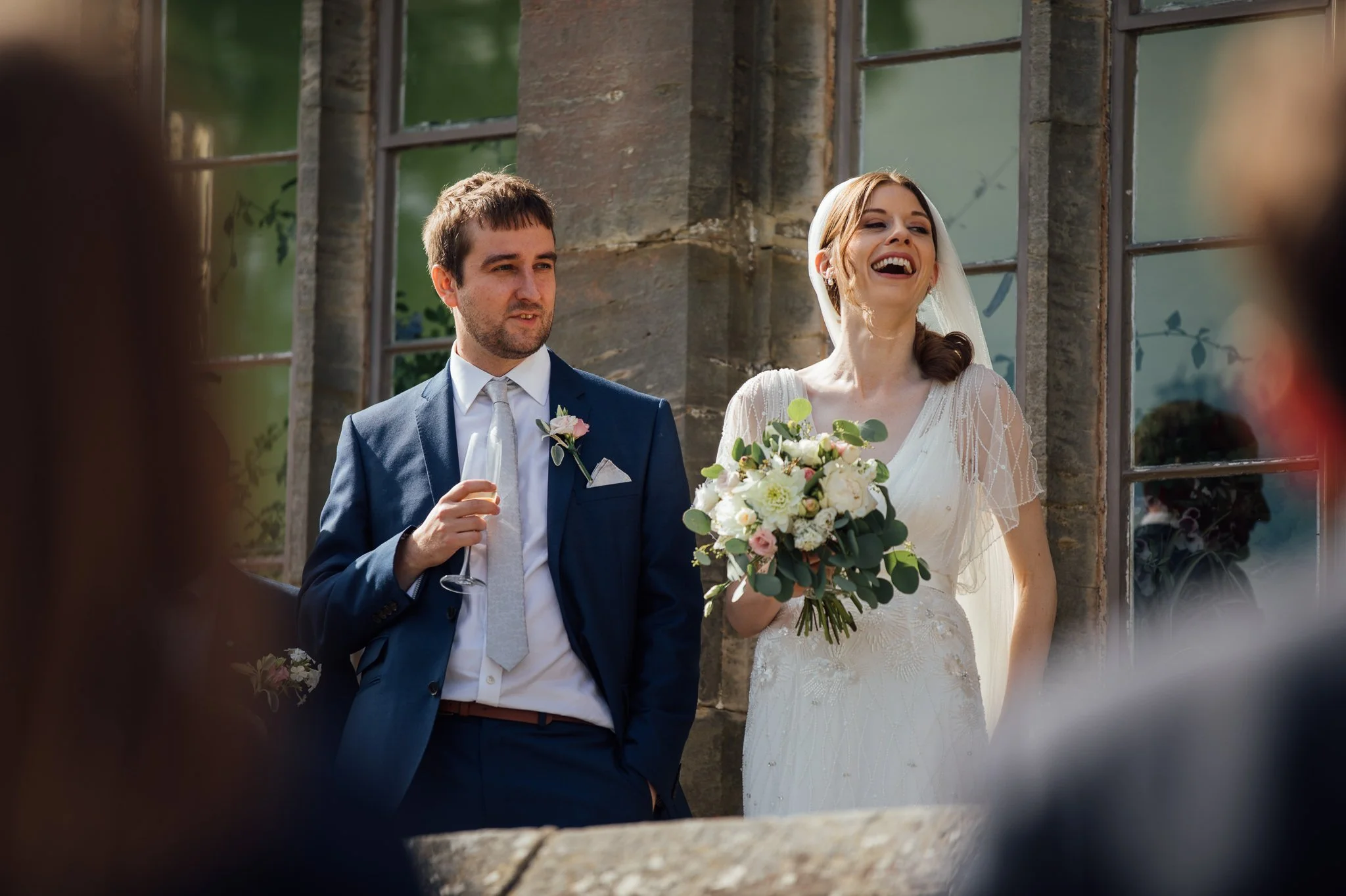  Bride and Groom listening to the wedding speeches  