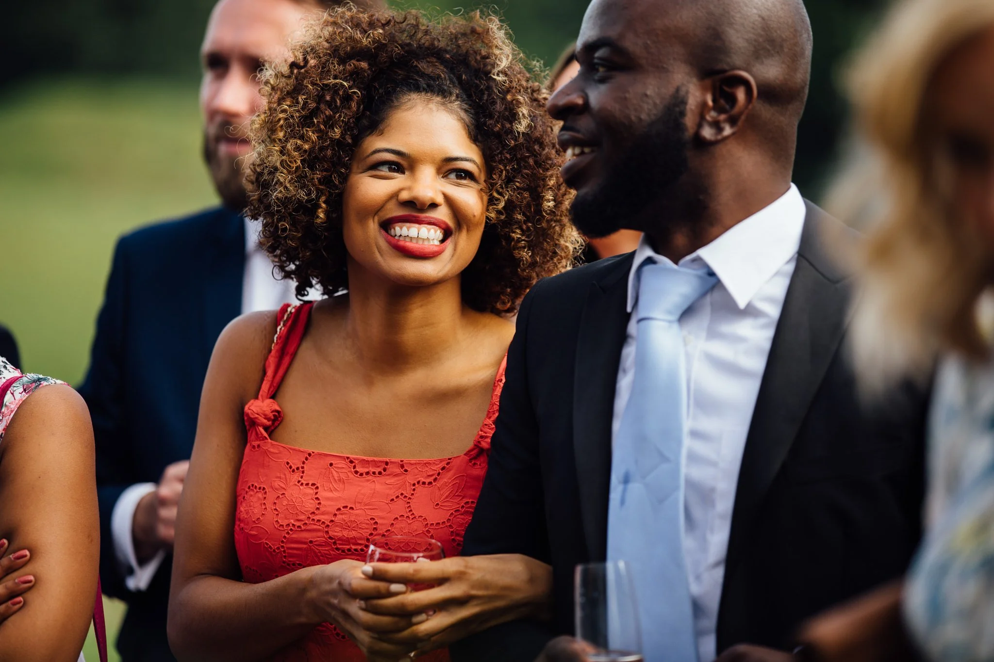  Wedding guest smiling 