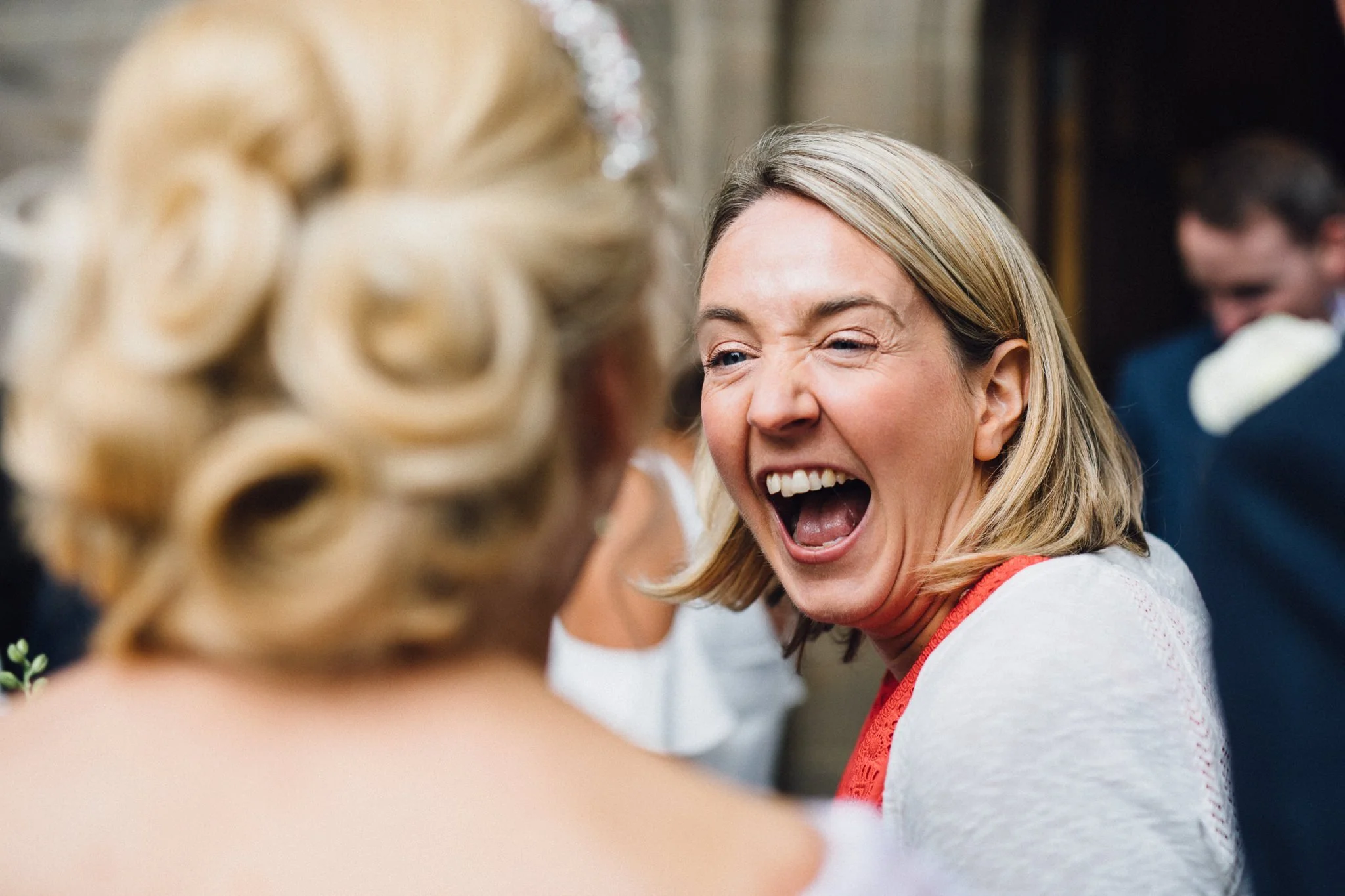  Wedding guest laughing 