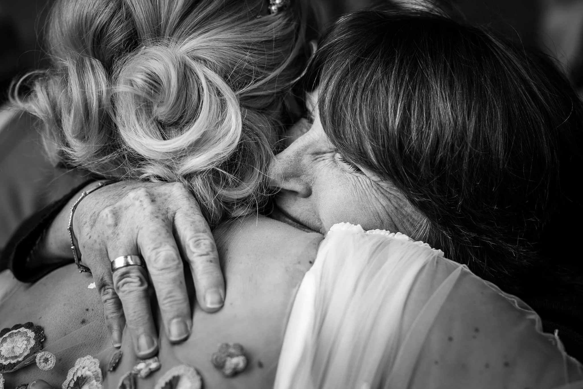  Wedding guest hugs the Bride 