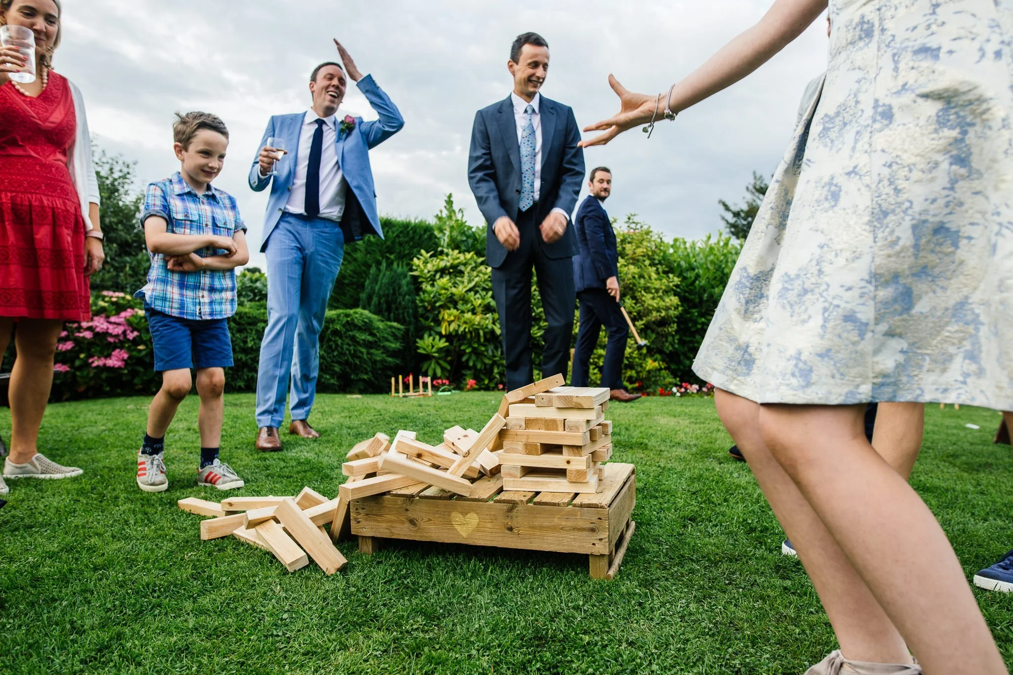  Group of wedding guest play Jenga 