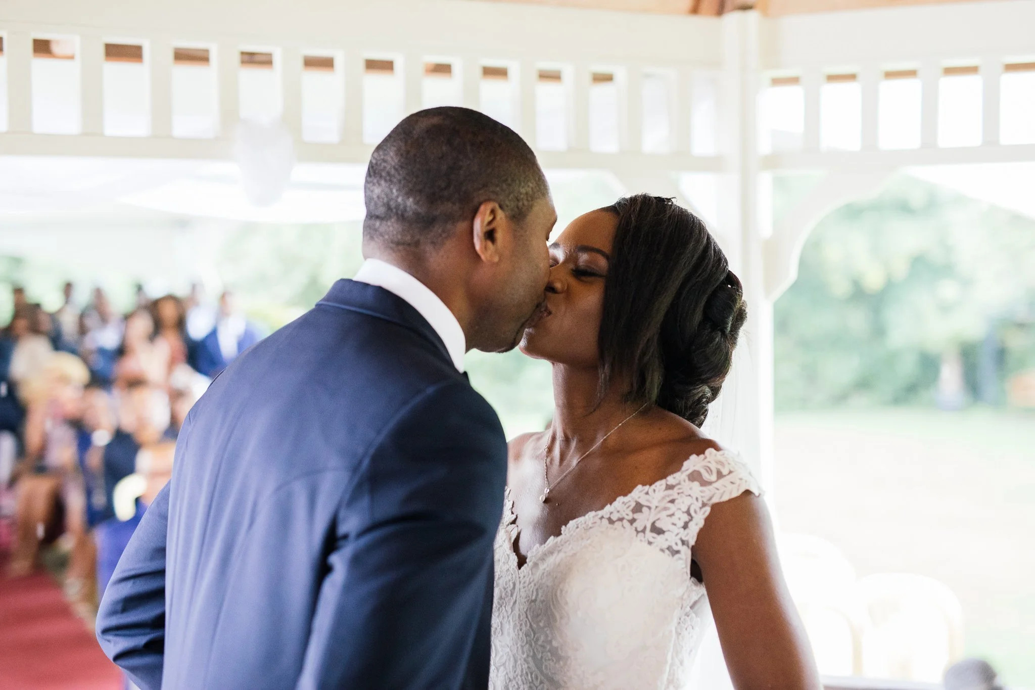  Bride and Groom kissing at Newland Hall Essex 