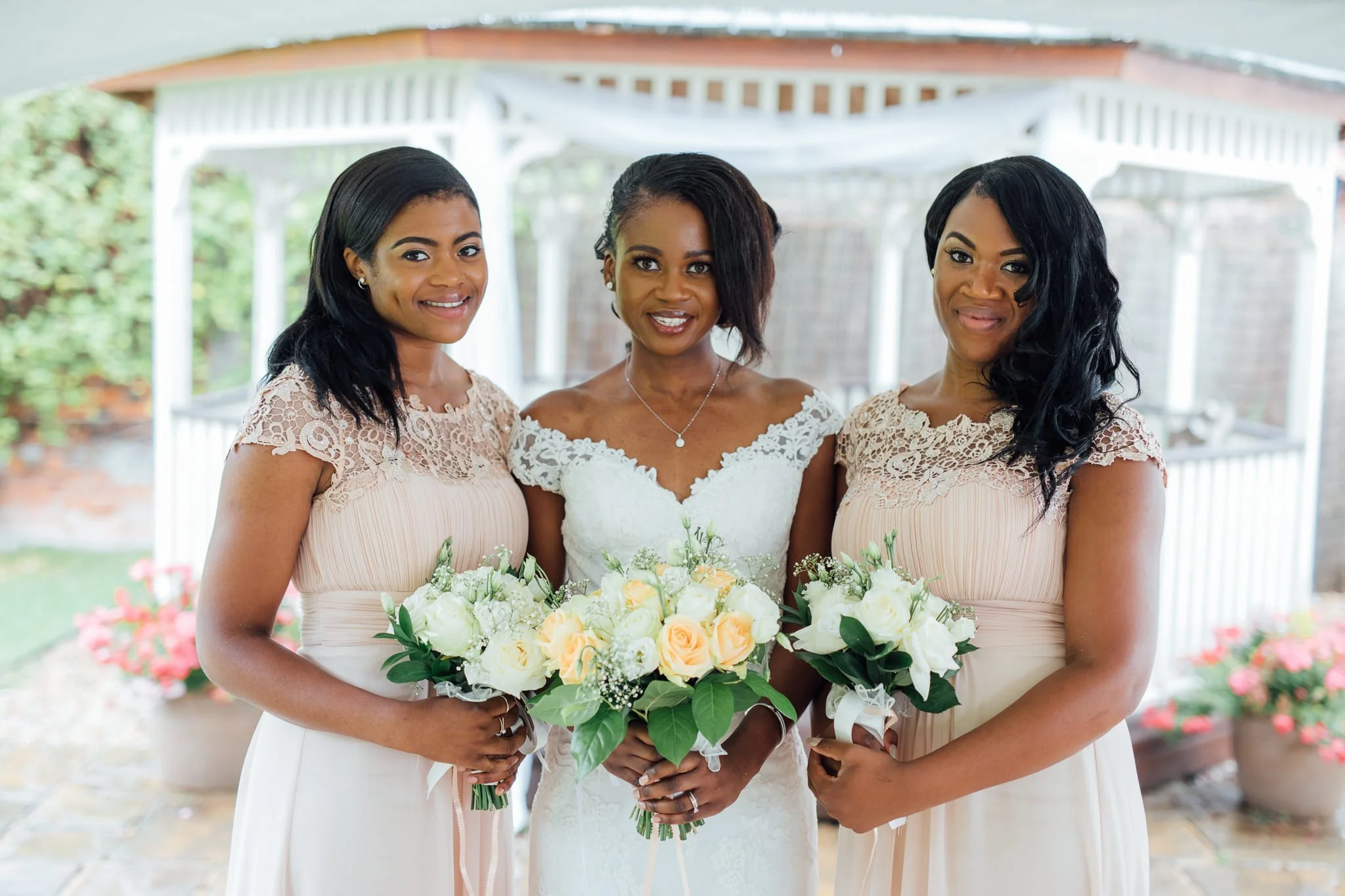  Bride with her Bridesmaids at Newland Hall Essex 