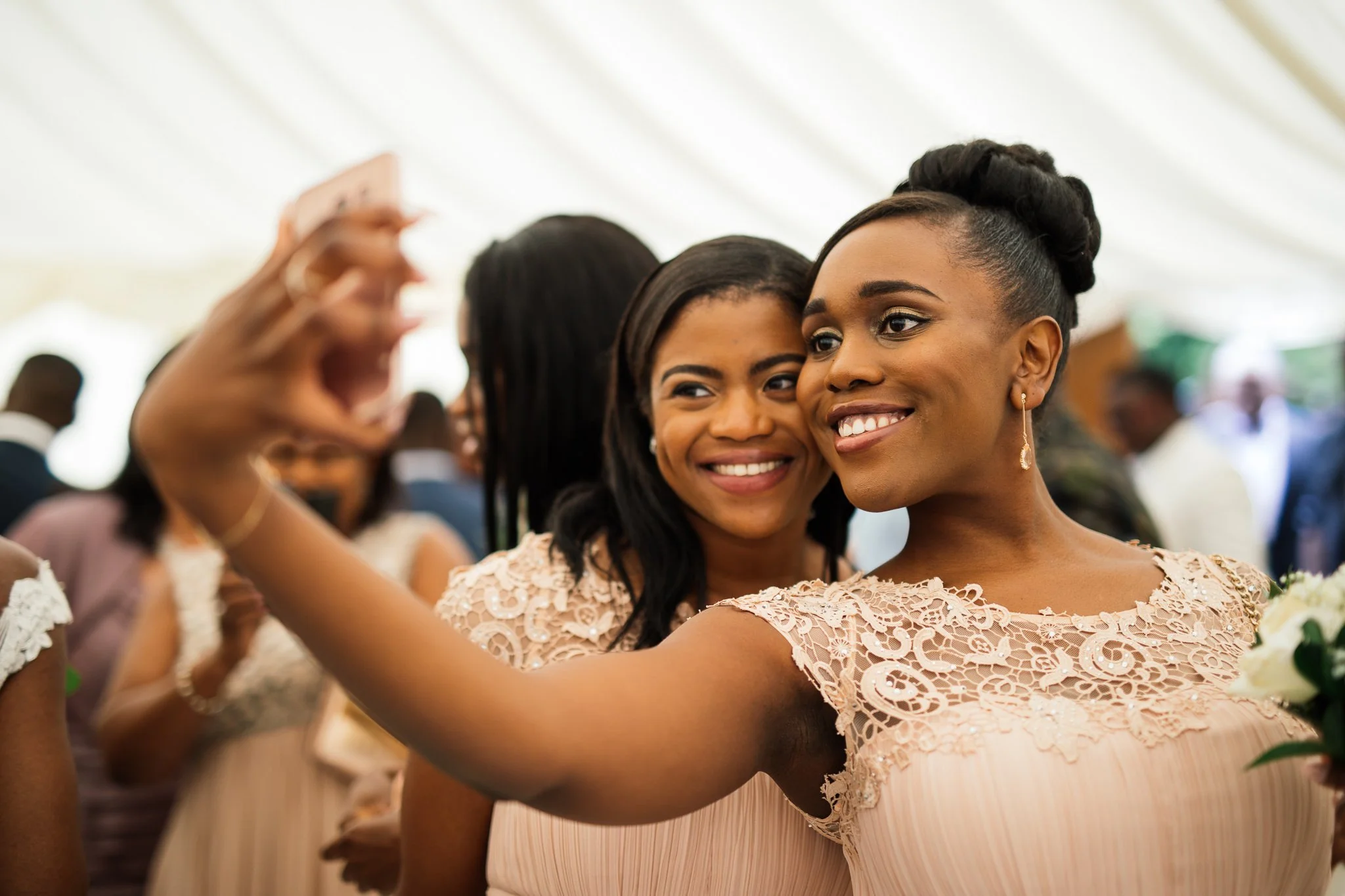  Wedding guest talk at selfie at Newland Hall Essex 