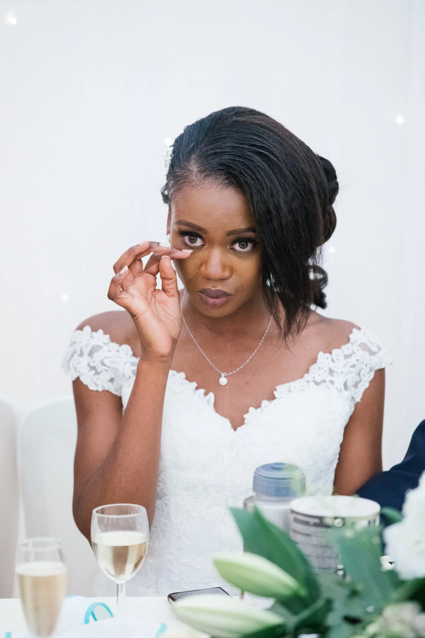  Bride wipes away a tear 
