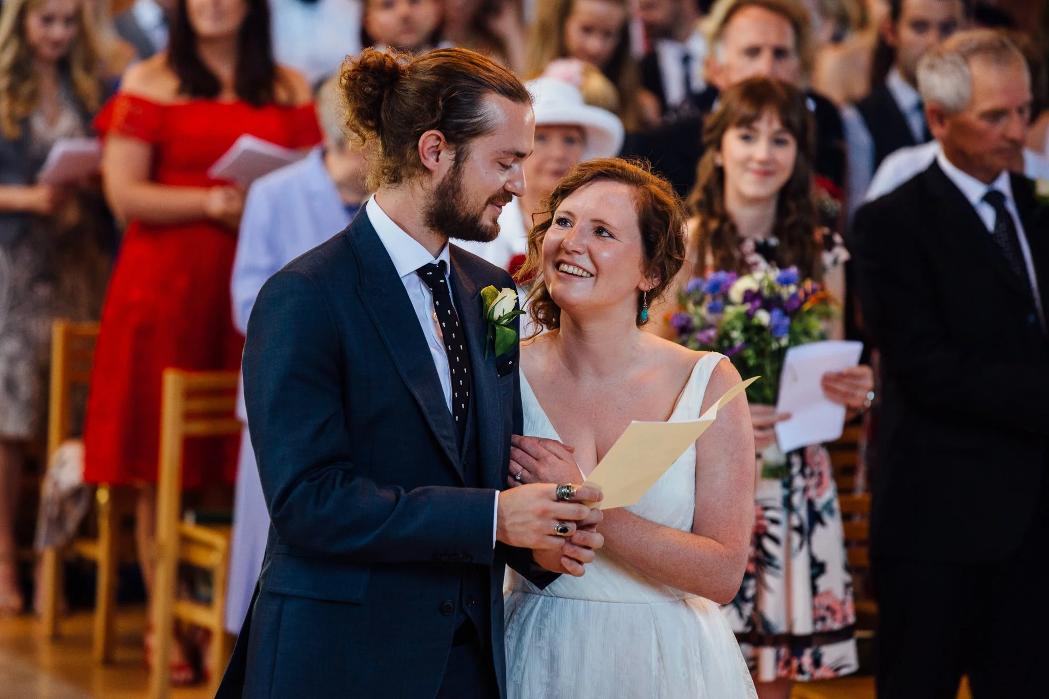  Bride and Groom holding each other at Inside of All Saints West Dulwich Church 