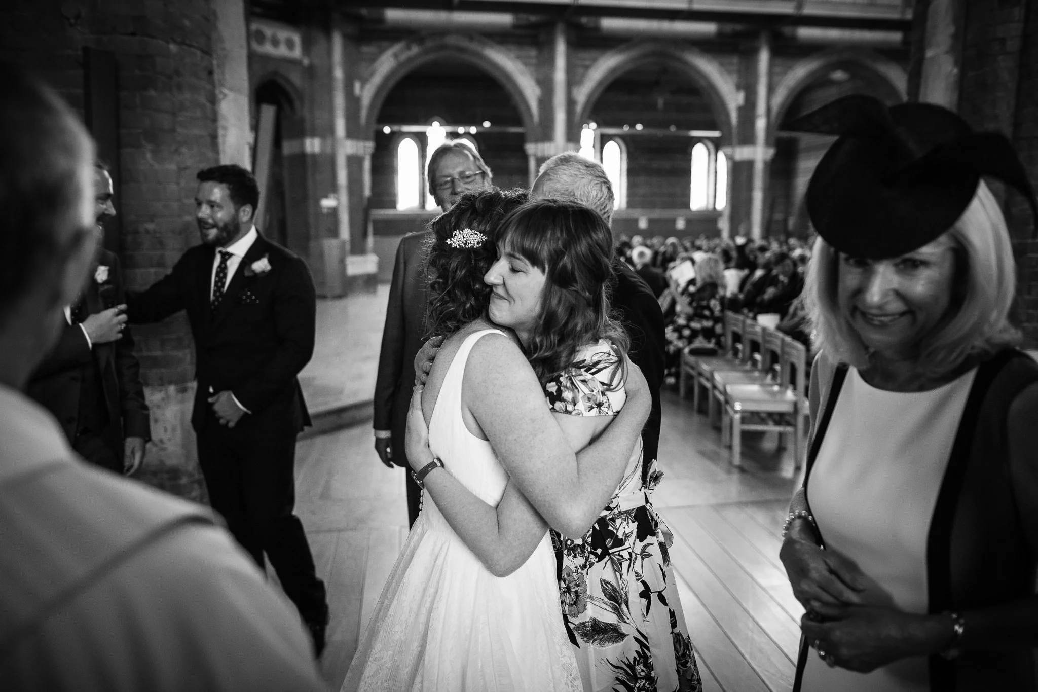  Guest hugs the Bride 