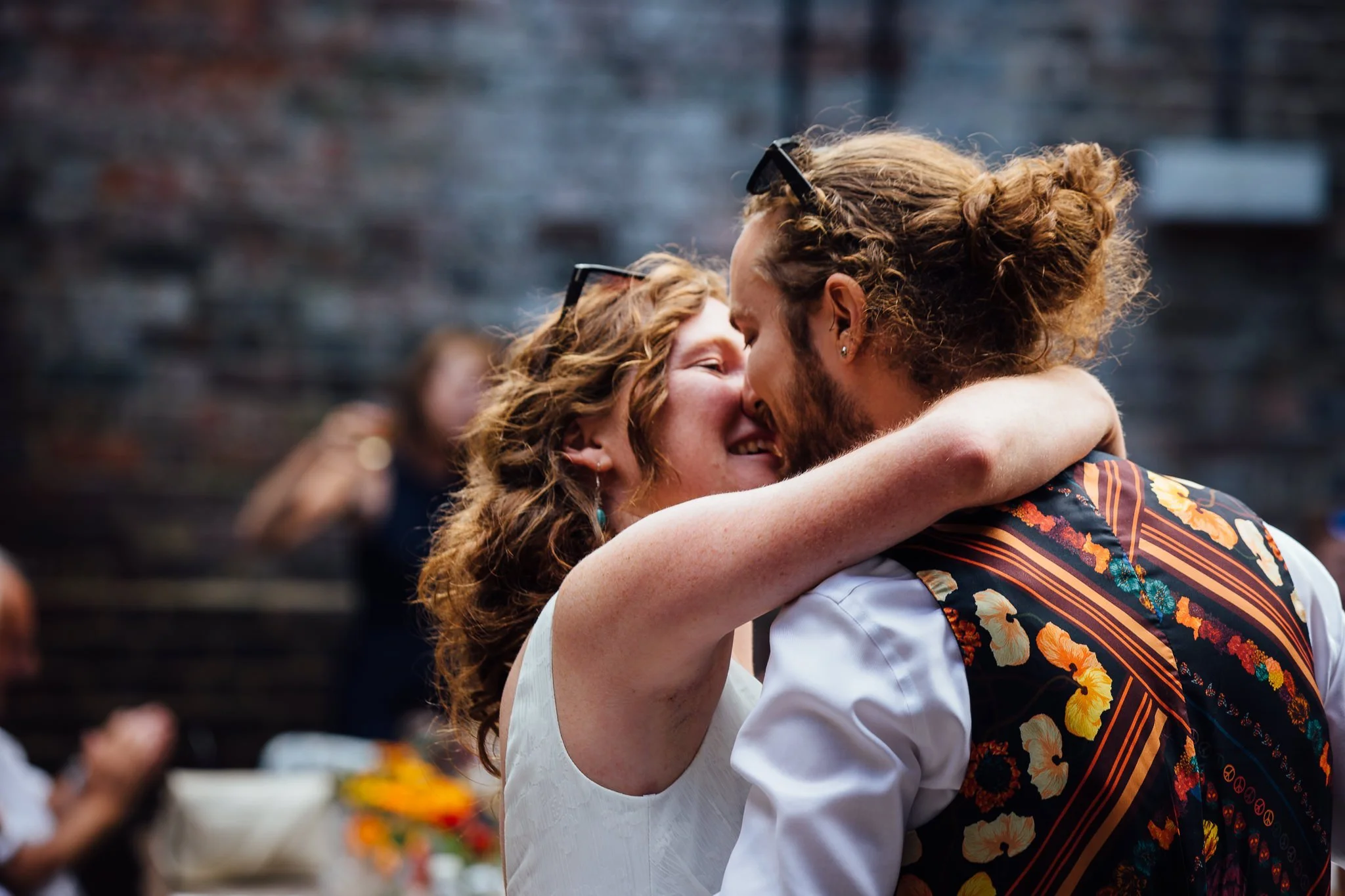  Bride kisses the groom at the end of his speech 