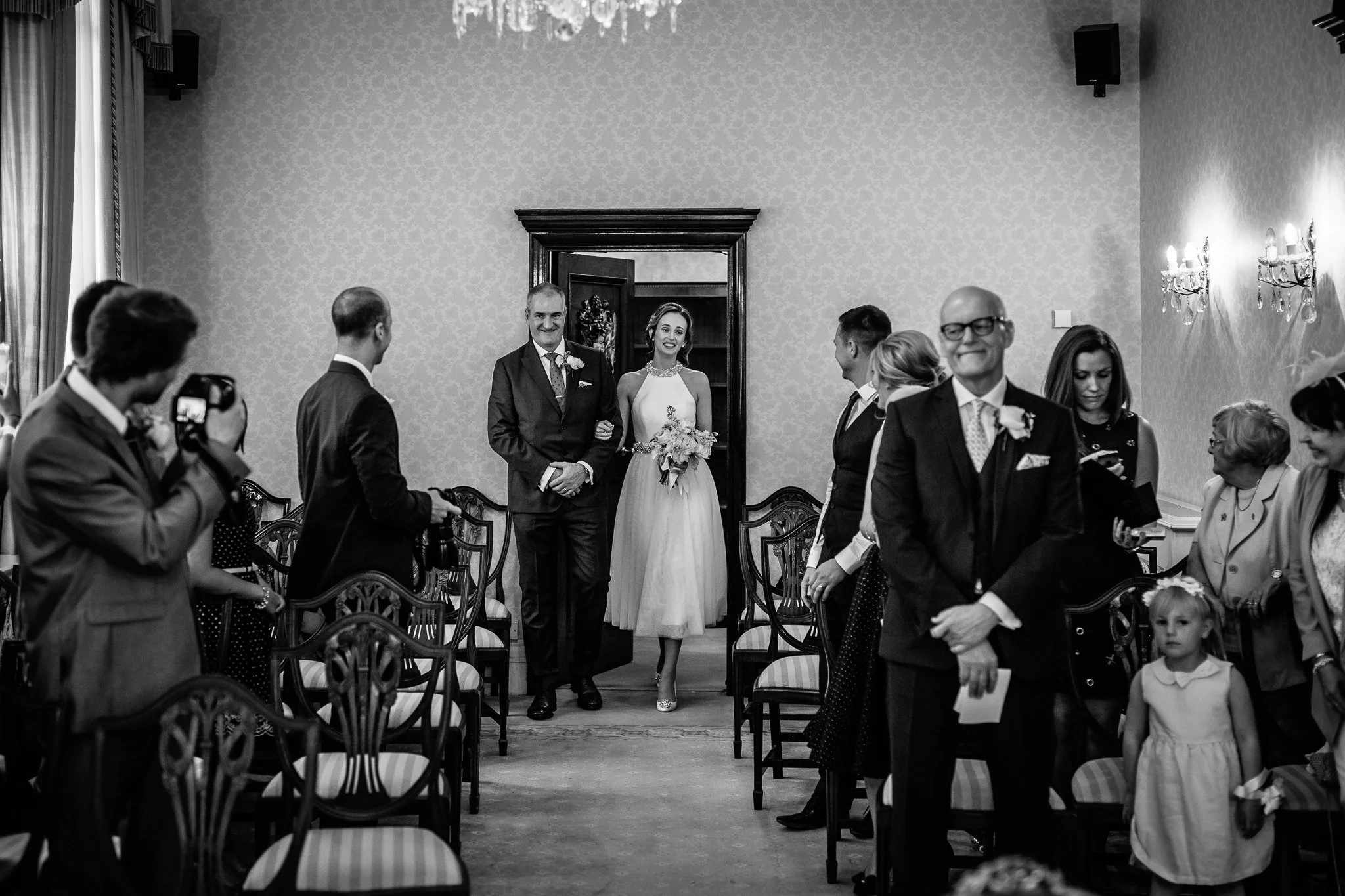  Bride walks down the aisle at Chelsea Old Town Hall 