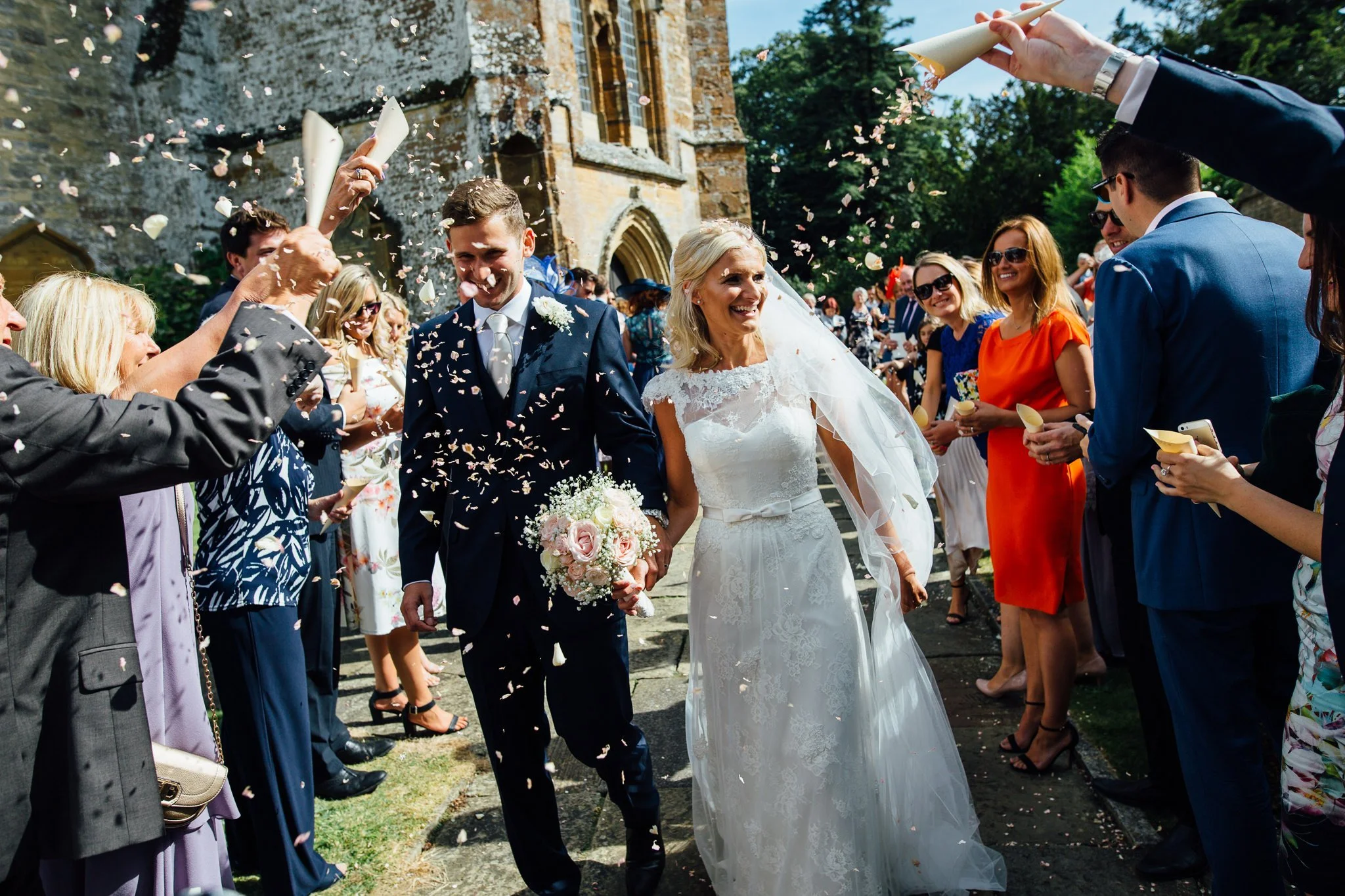  Bride and Groom have confetti thrown at them at St Michael's Church Aynho, Banbury OX17 3BQ 