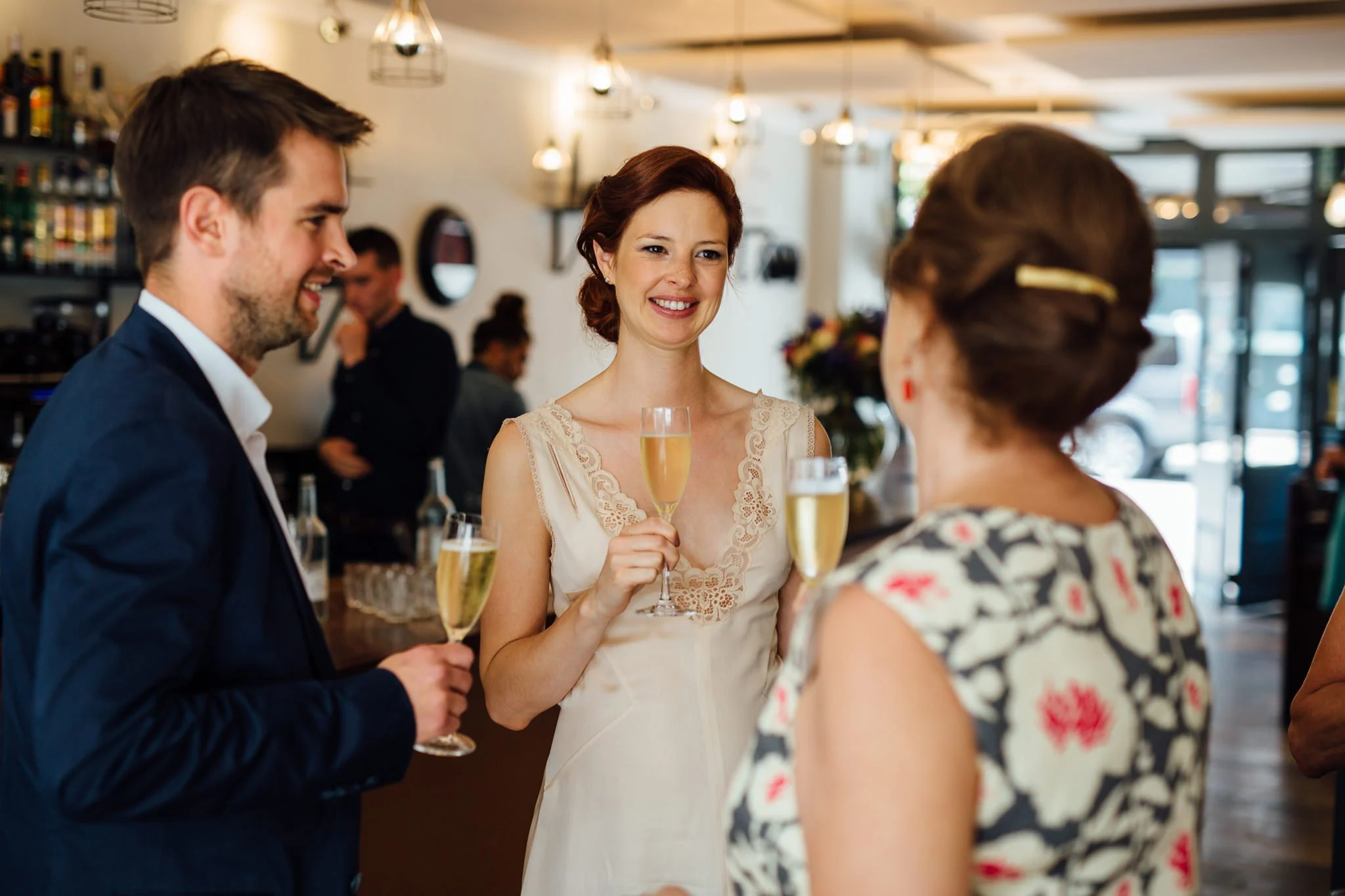  Bride drinking a glass of champagne 