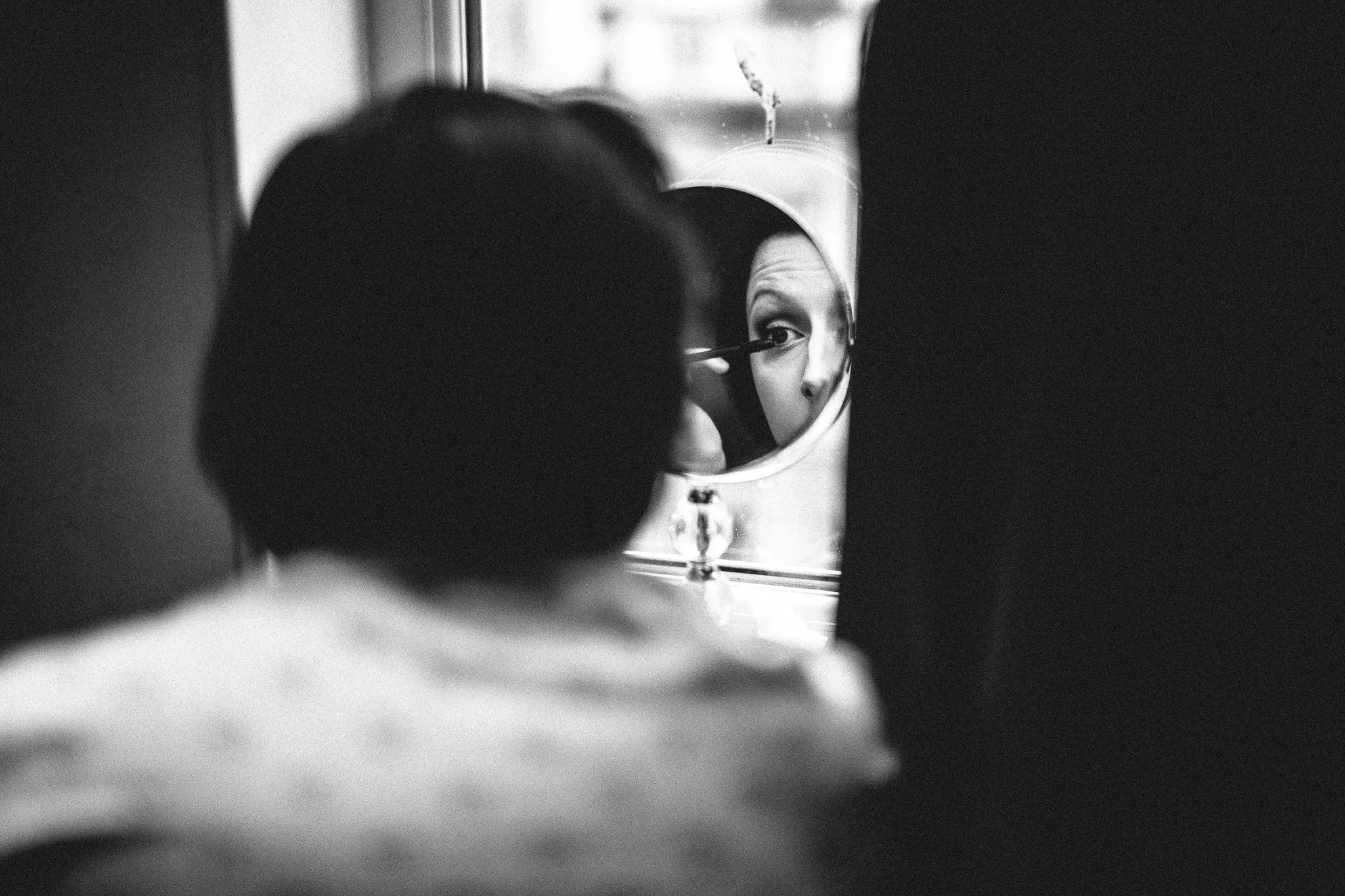  Bride applying makeup 