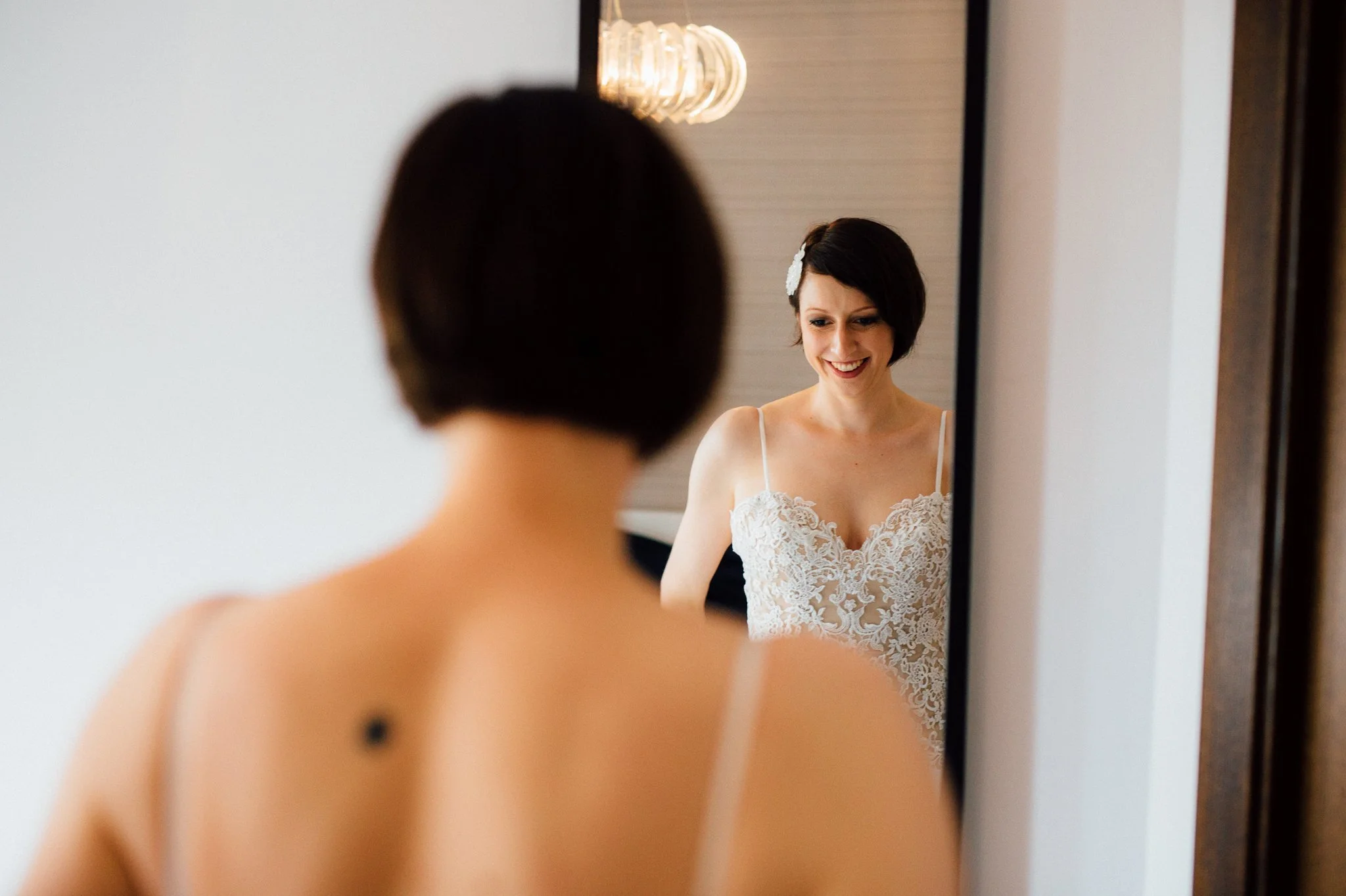  Bride looking at her reflection 