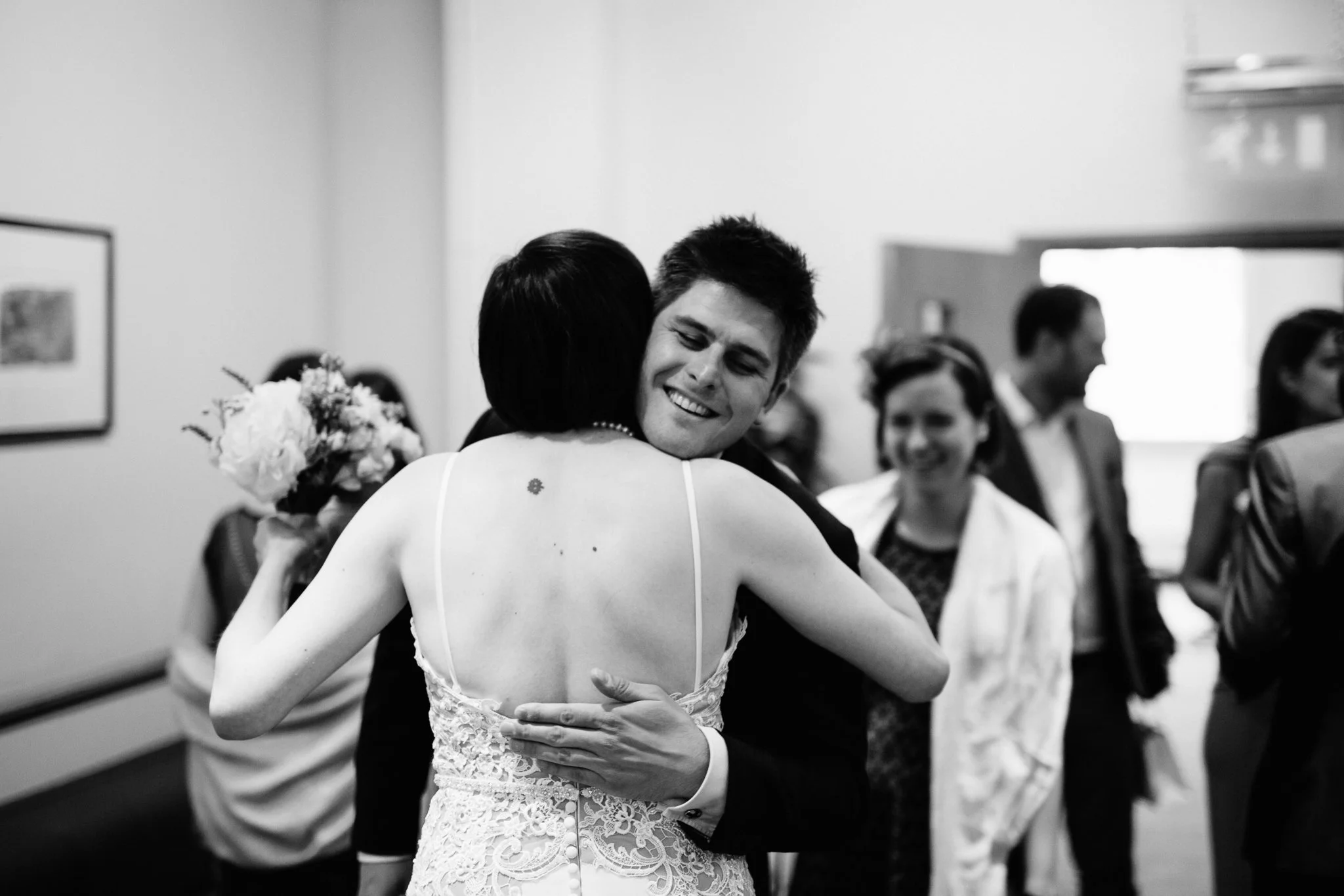  Guests hugging in Camden Town Hall 