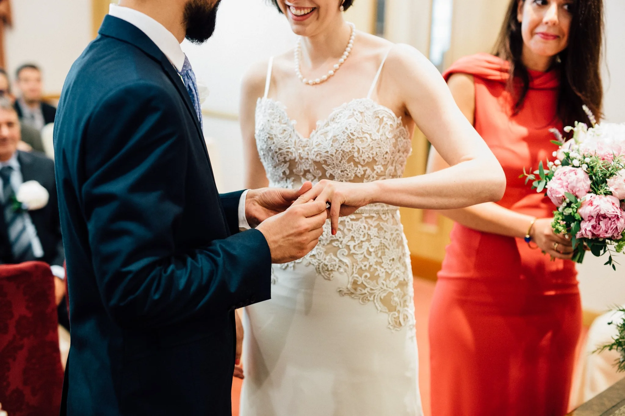  Groom places ring on the Bride’s finger. 