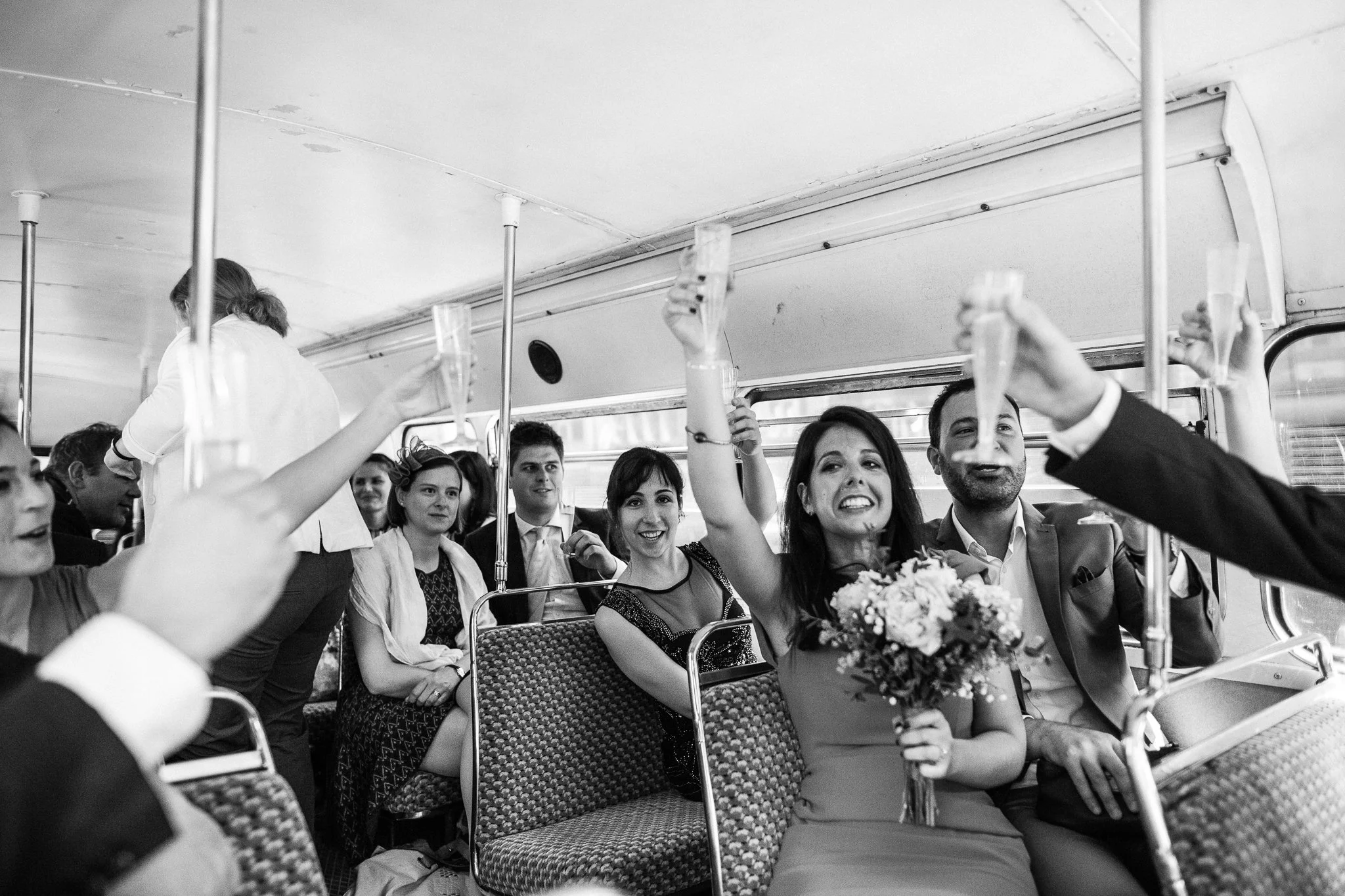  Wedding guests celebrate with their drinks 