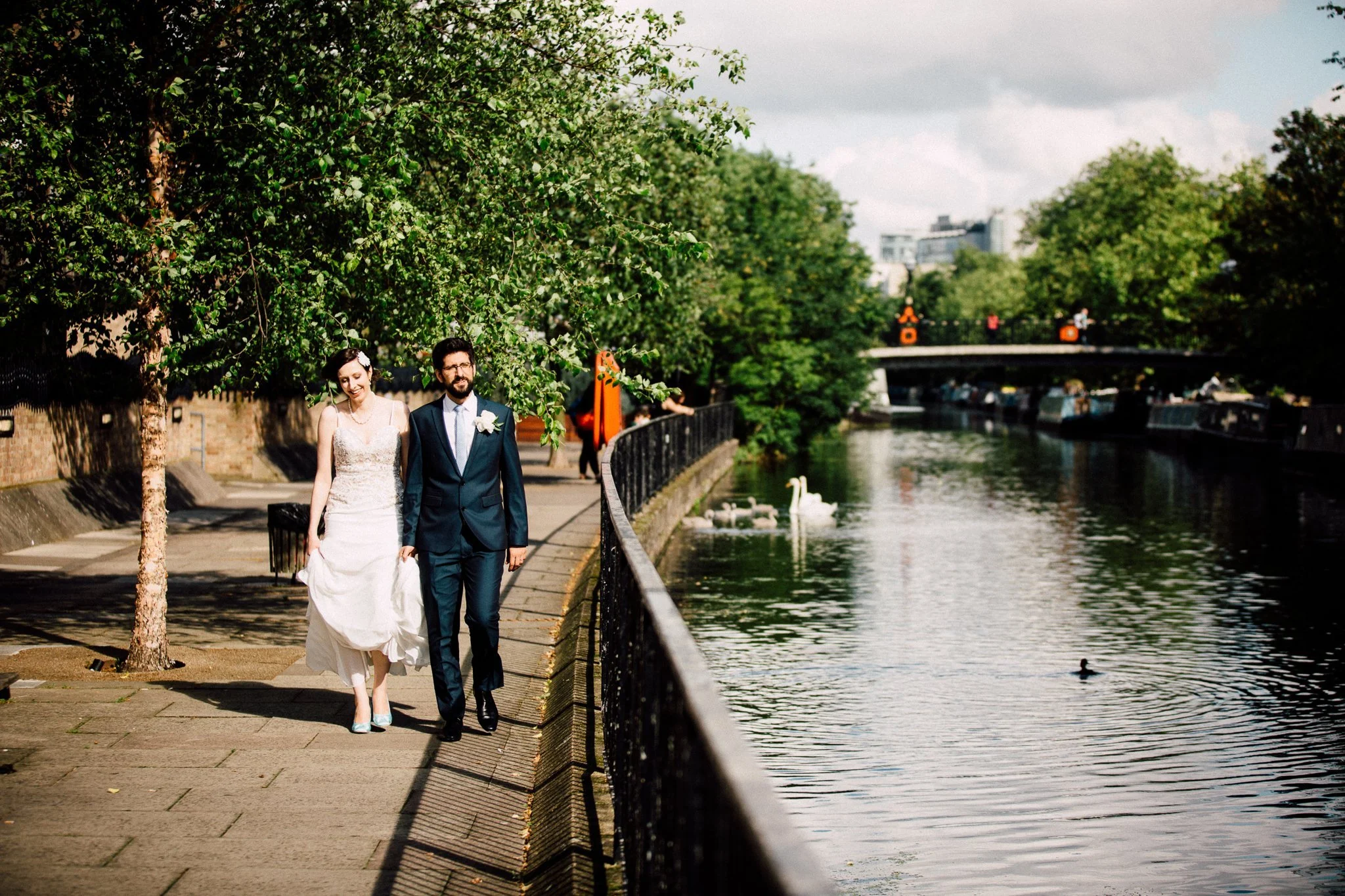  Bride and Groom walk next to the canal in Maida Vale 