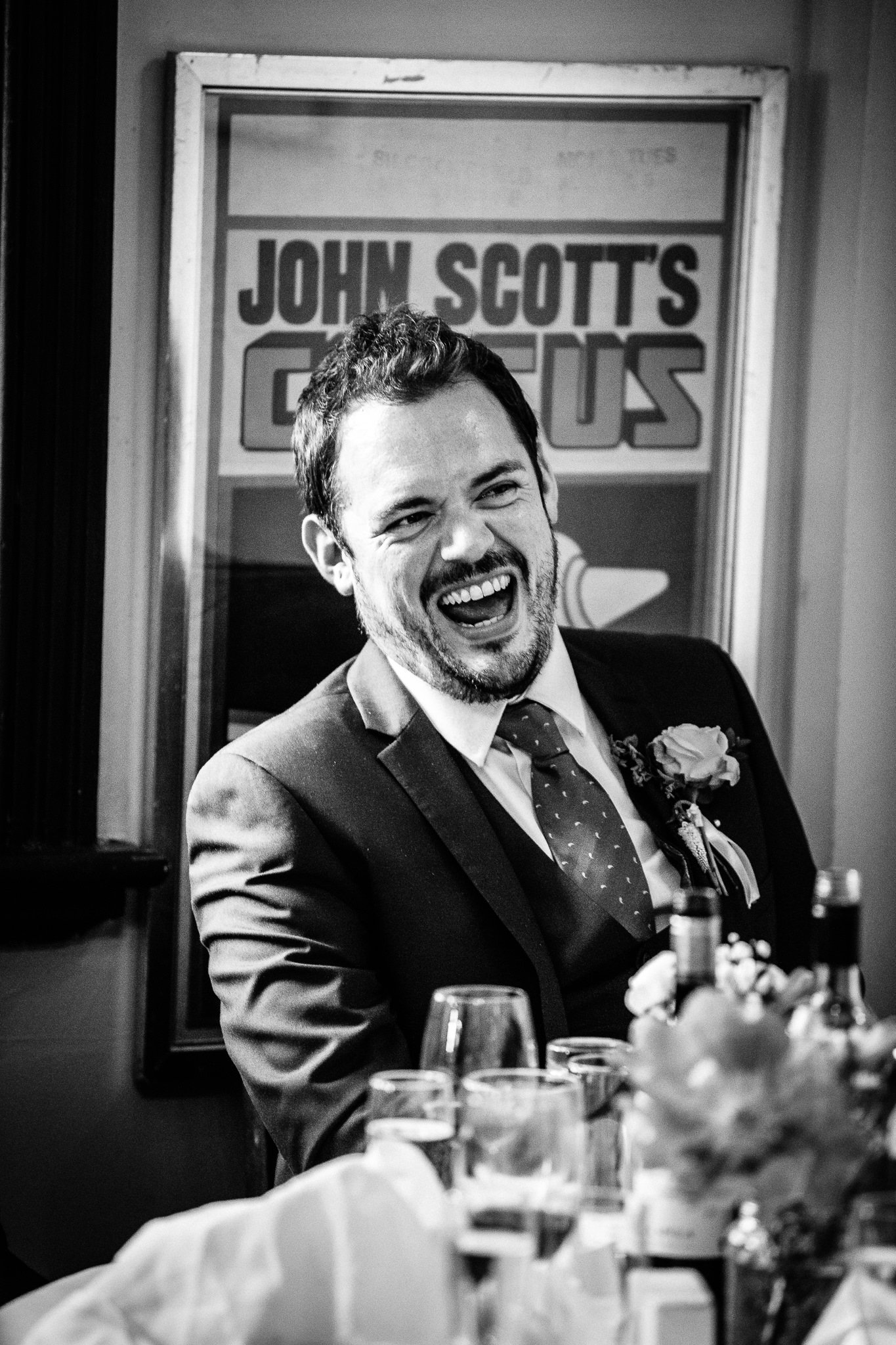  Wedding guest laughing 