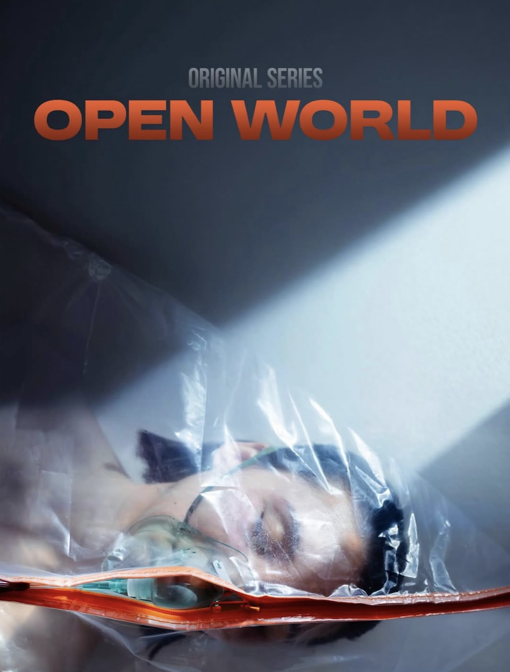 A person lying inside a clear plastic bag with medical oxygen mask, with a dark background and red text that reads 'Open World'.