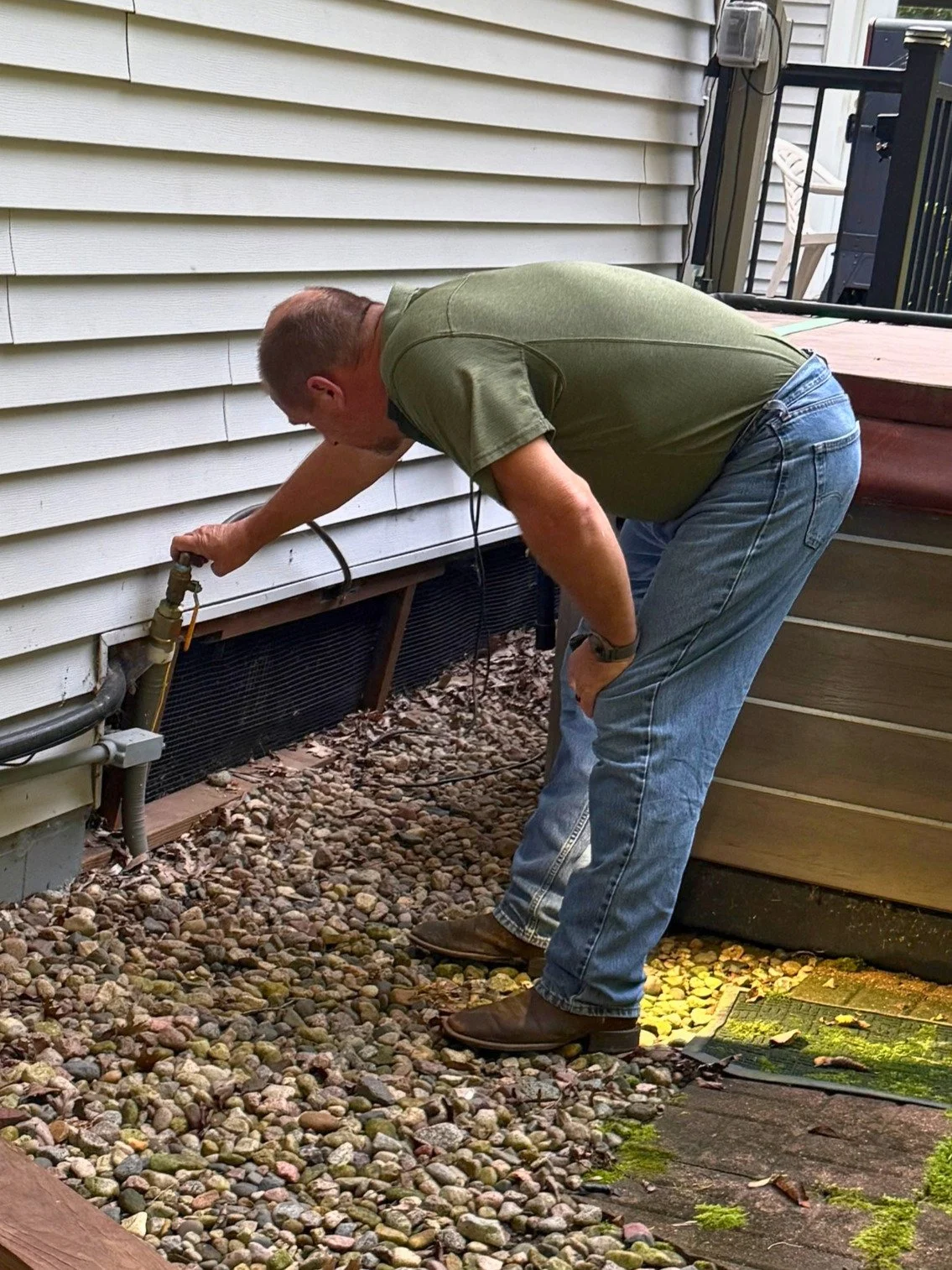 Daryl Trautmiller inspecting connection