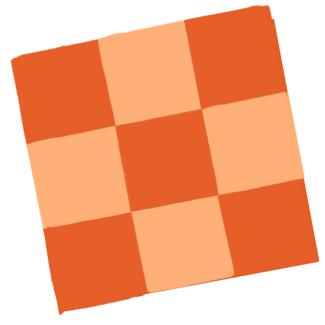 A top-down view of a checkered table or surface with alternating orange and peach-colored squares.