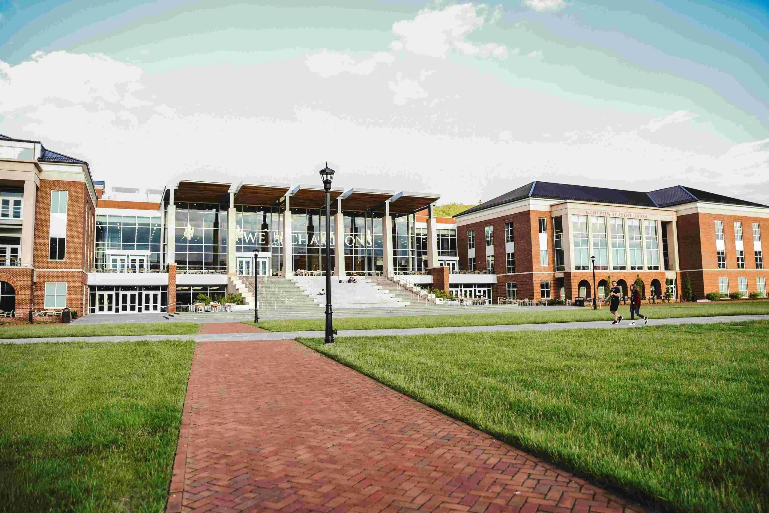 Administrative building on a college campus with brick structure and large windows