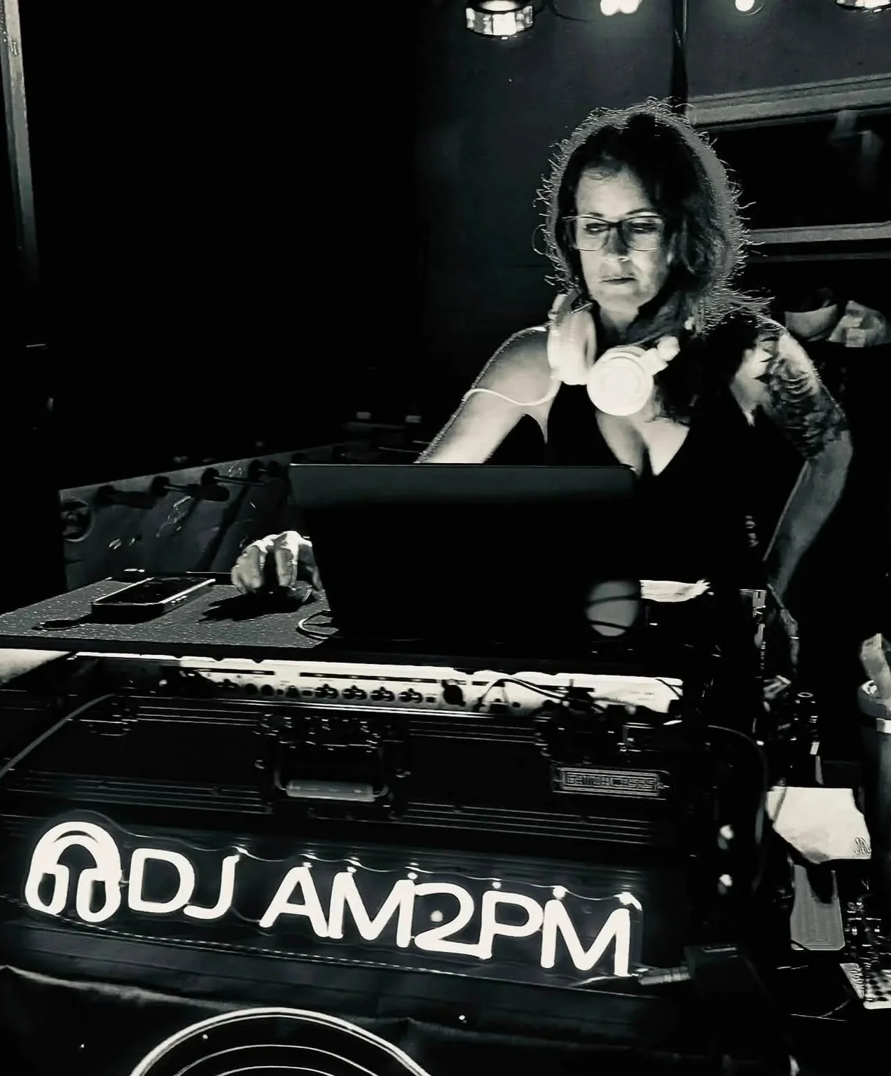DJ AM2PM husband-and-wife DJ team performing together at weddings, bars and private events