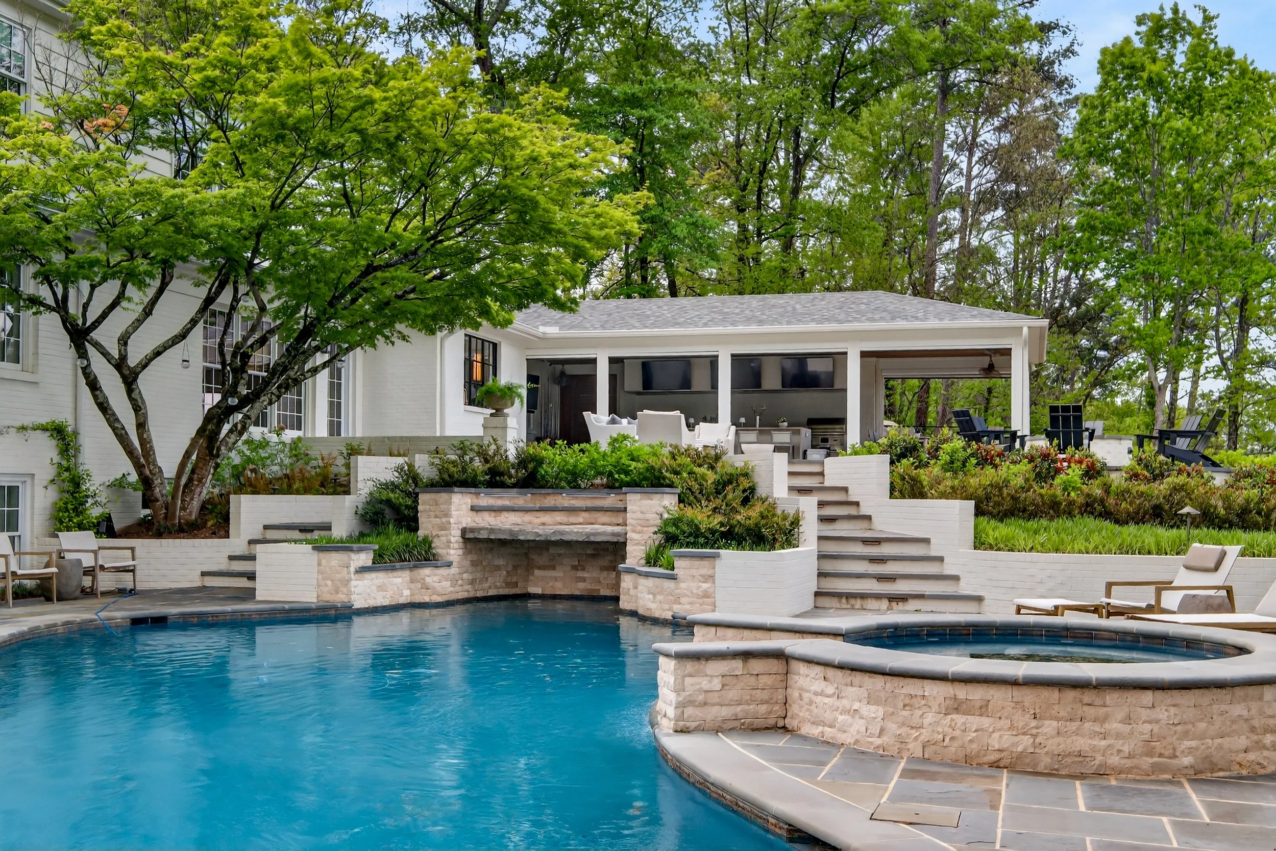 This renovation transformed the home to better fit our clients' lifestyle. The project included a complete kitchen renovation, the conversion of an existing carport into a functional office and laundry room, and the addition of an outdoor entertainin