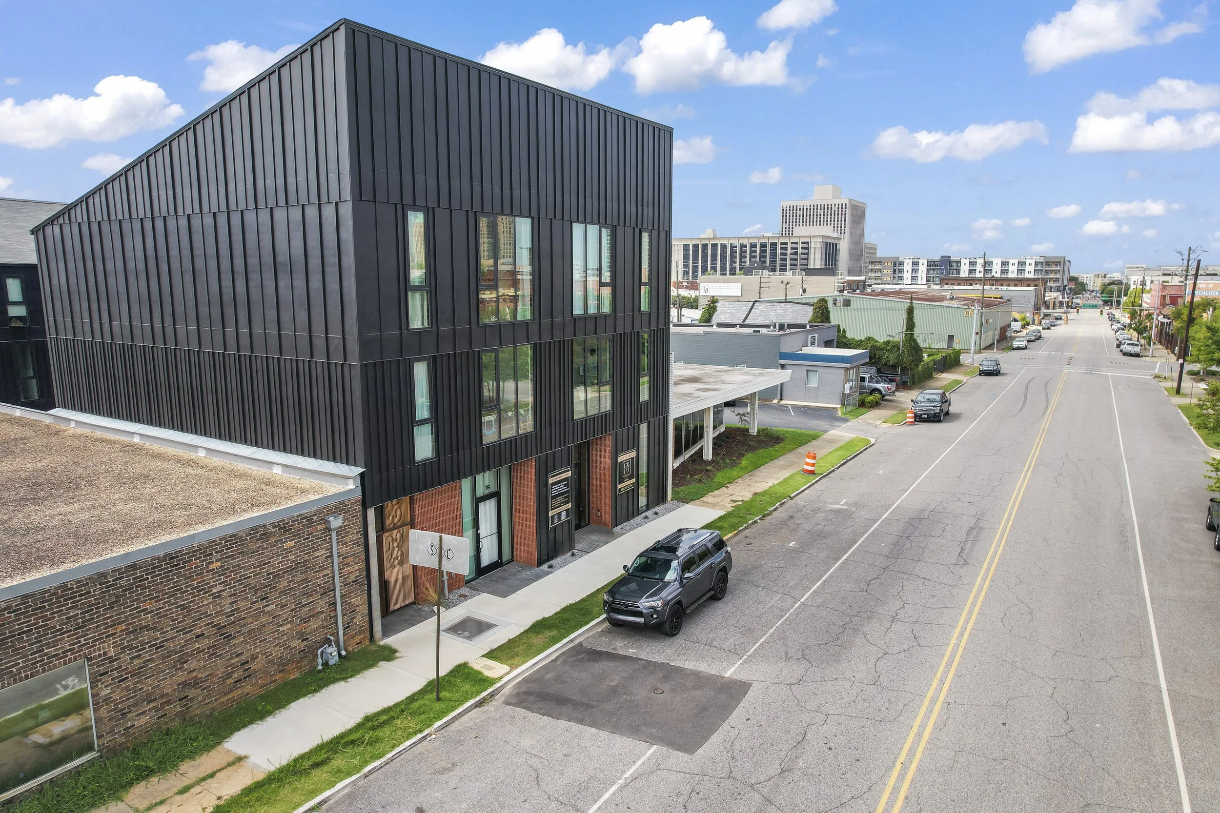 These unique condominiums are designed as two separate buildings connected by a central courtyard, creating a distinctive residential community overlooking the heart of the city. Started before COVID and completed during the pandemic, the project req
