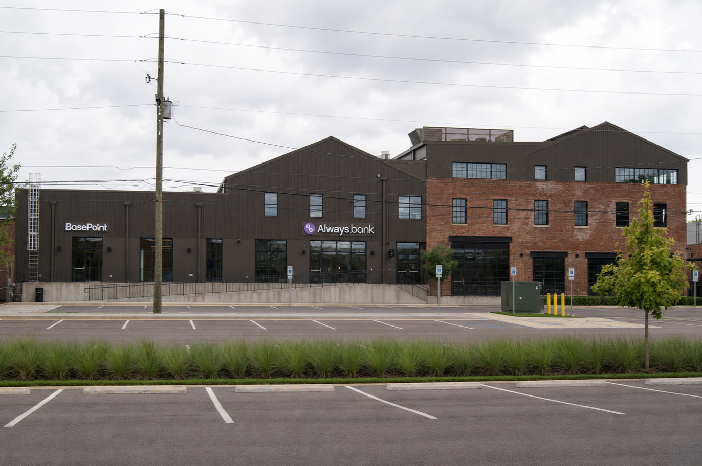 Located in Birmingham’s historic Hardwick Building, this interior build-out transformed an unfinished space into Always.bank’s corporate HQ and BasePoint, a dedicated workspace and resource for small-business owners. The space combines private office