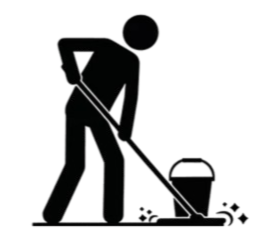 Silhouette of a person cleaning or mopping the floor in a dark environment.