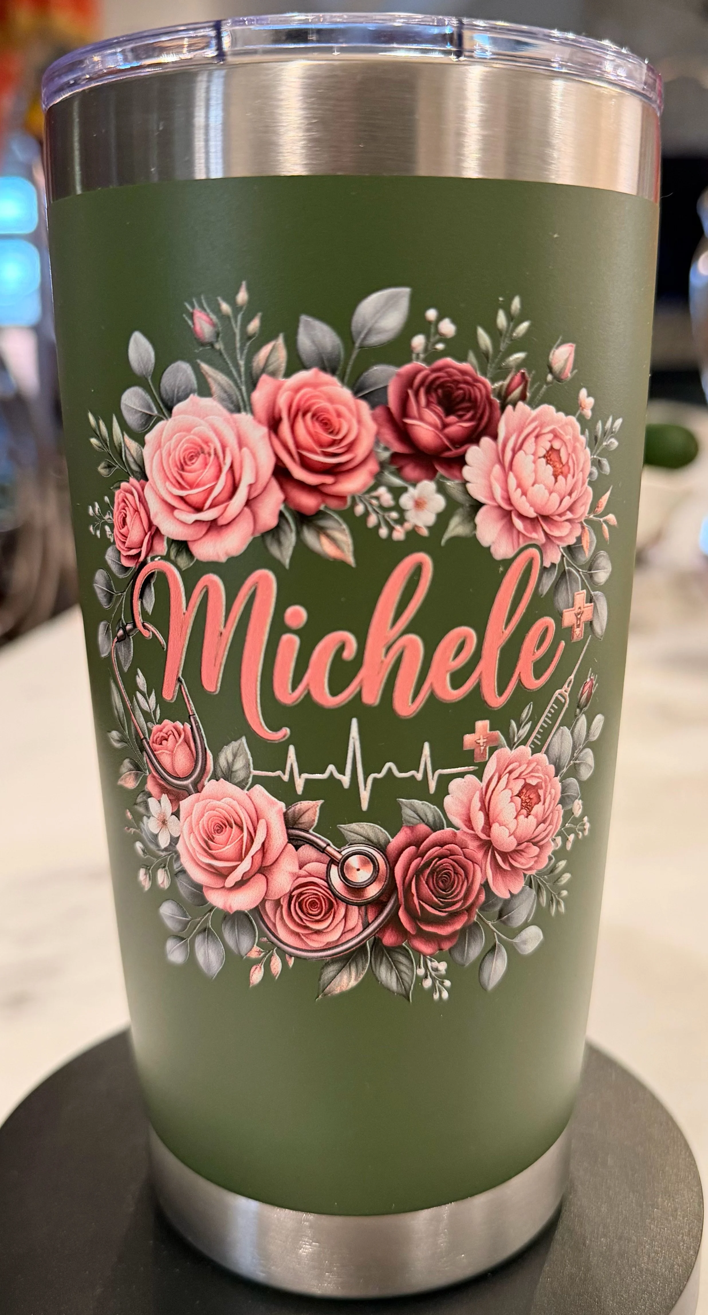Made just for Michele — a personalized tumbler with vibrant floral artwork.