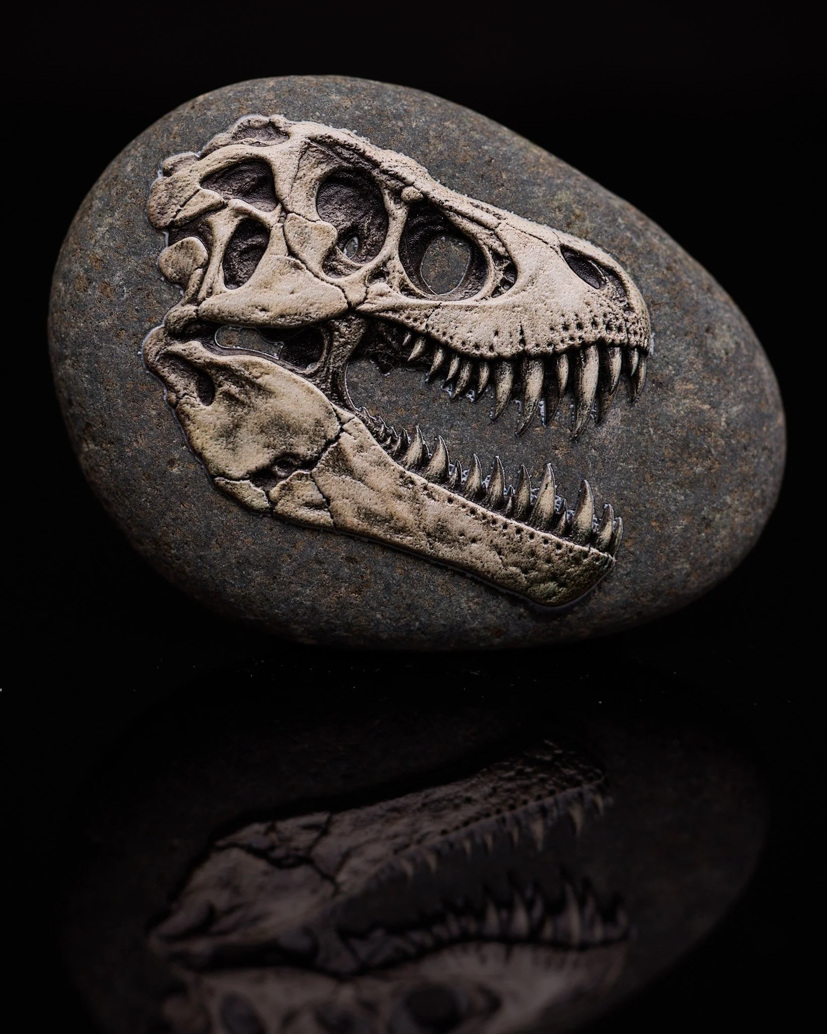 T-Rex fossil-inspired rock art — a bold centerpiece for a fossil art collection.