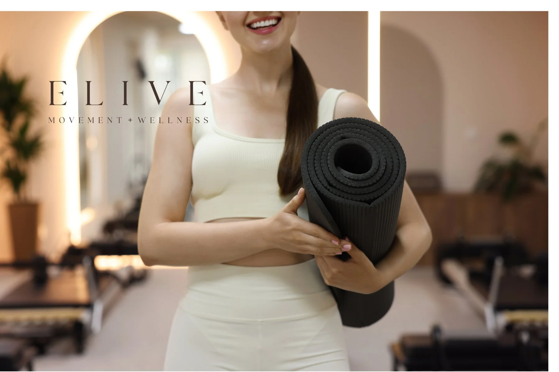 Woman practicing Mat Pilates at Elive Movement