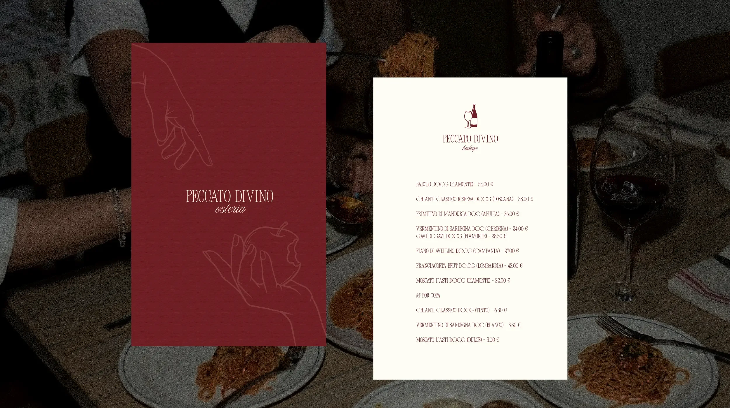 A menu on a table at a restaurant called "Pecato Divino," which serves Italian food and wine, with the dishes and prices clearly displayed, surrounded by food and drinks on the table.