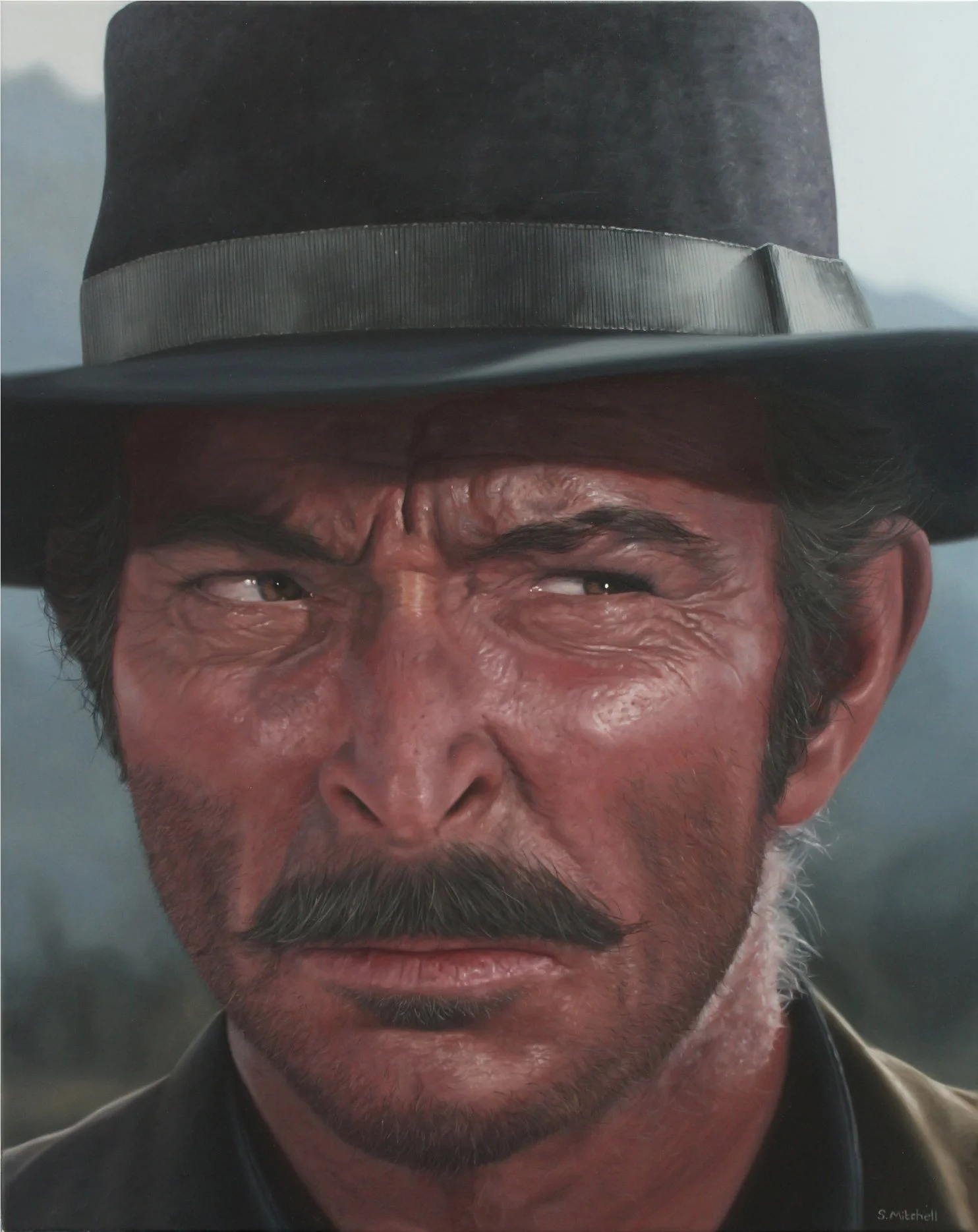 Close-up of a man wearing a black fedora hat, with a mustache and beard, looking slightly to his right.