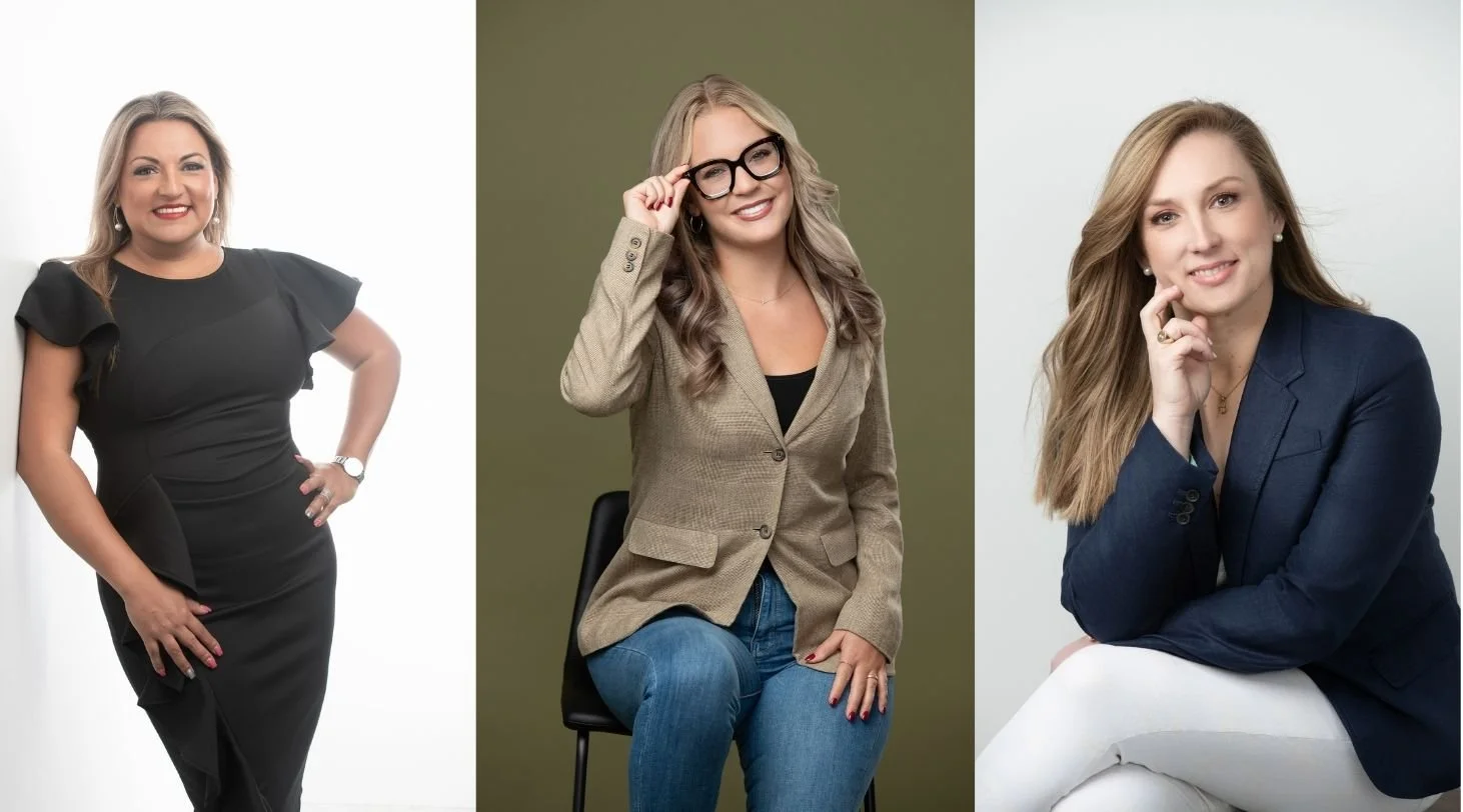 Three women in professional attire posing for photos: one in a black dress on the left, one in a tan blazer and glasses in the middle, and one in a navy blazer and white pants on the right.