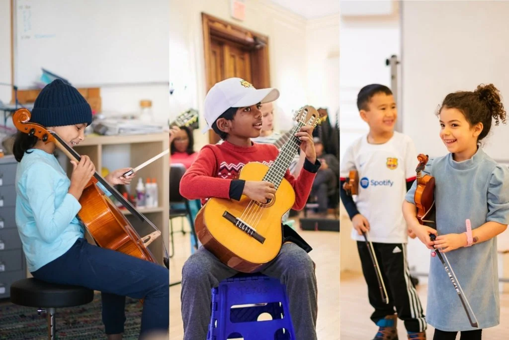 Children playing musical instruments, including a girl playing the violin, a boy playing an acoustic guitar, and a girl holding a violin and a flute, in a classroom or music room.